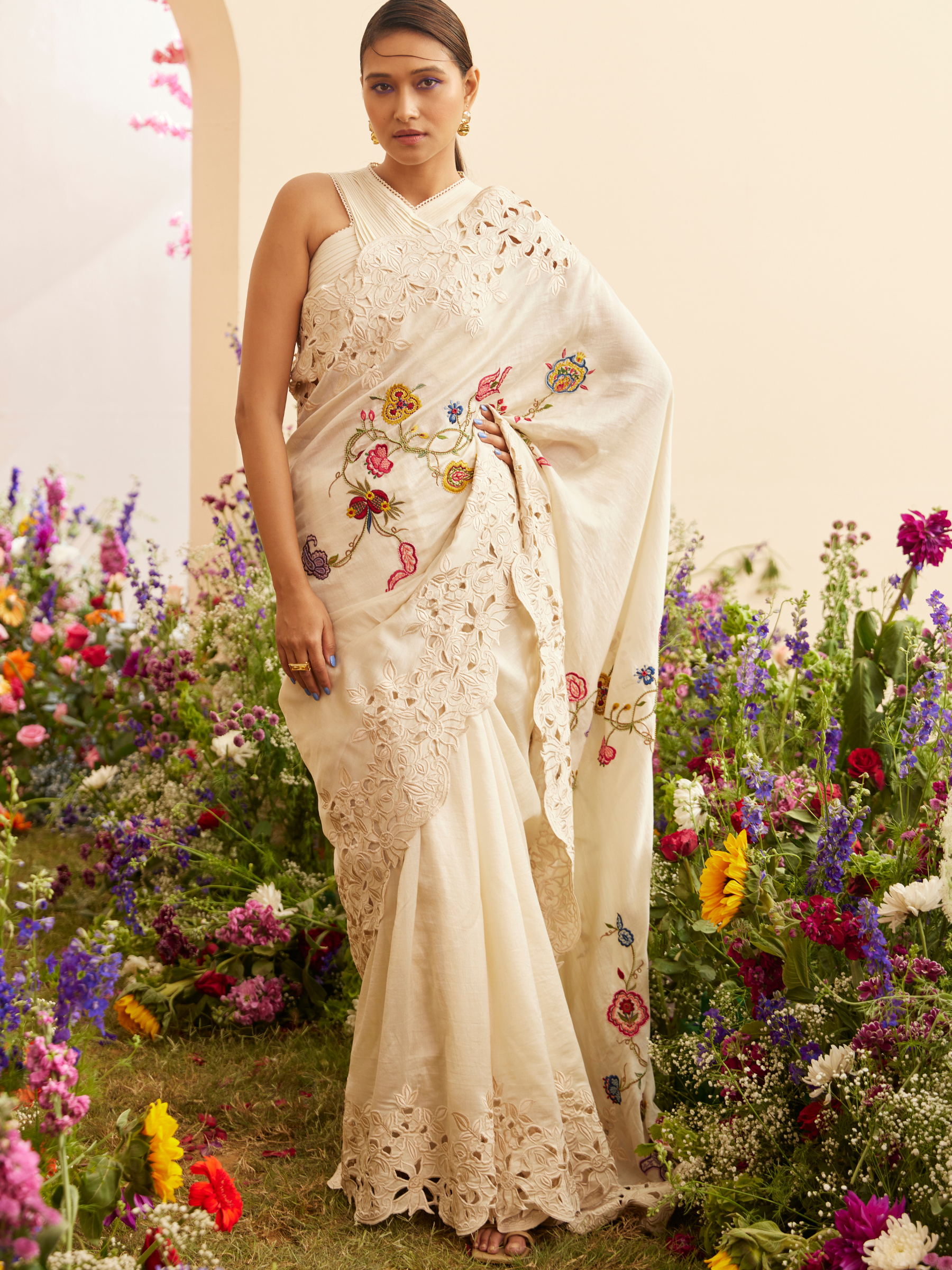 Ivory Embroidered And Cutwork Saree