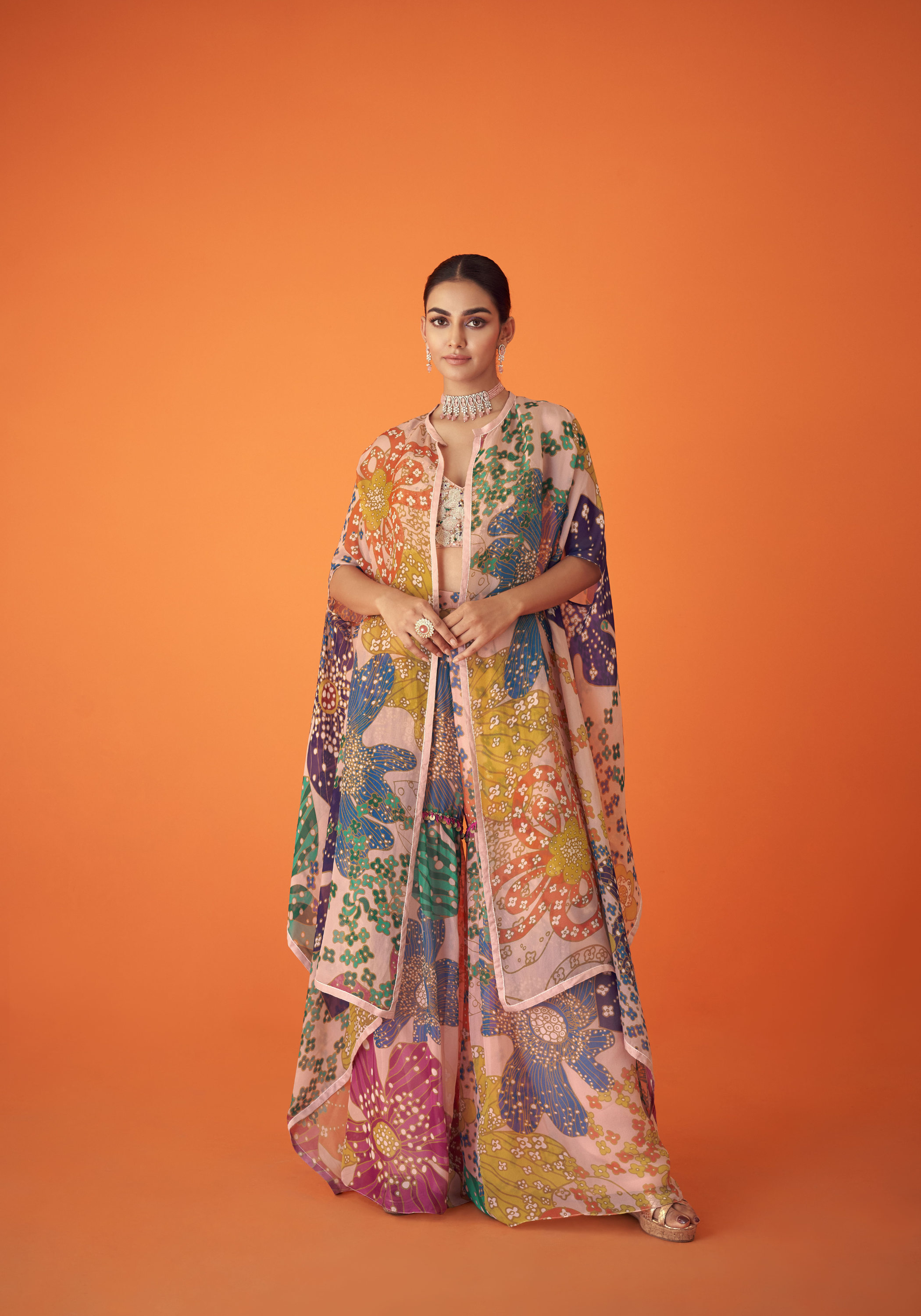 Peach Printed Organza Cape Paired With Sharara Pants And Embellished Bustier