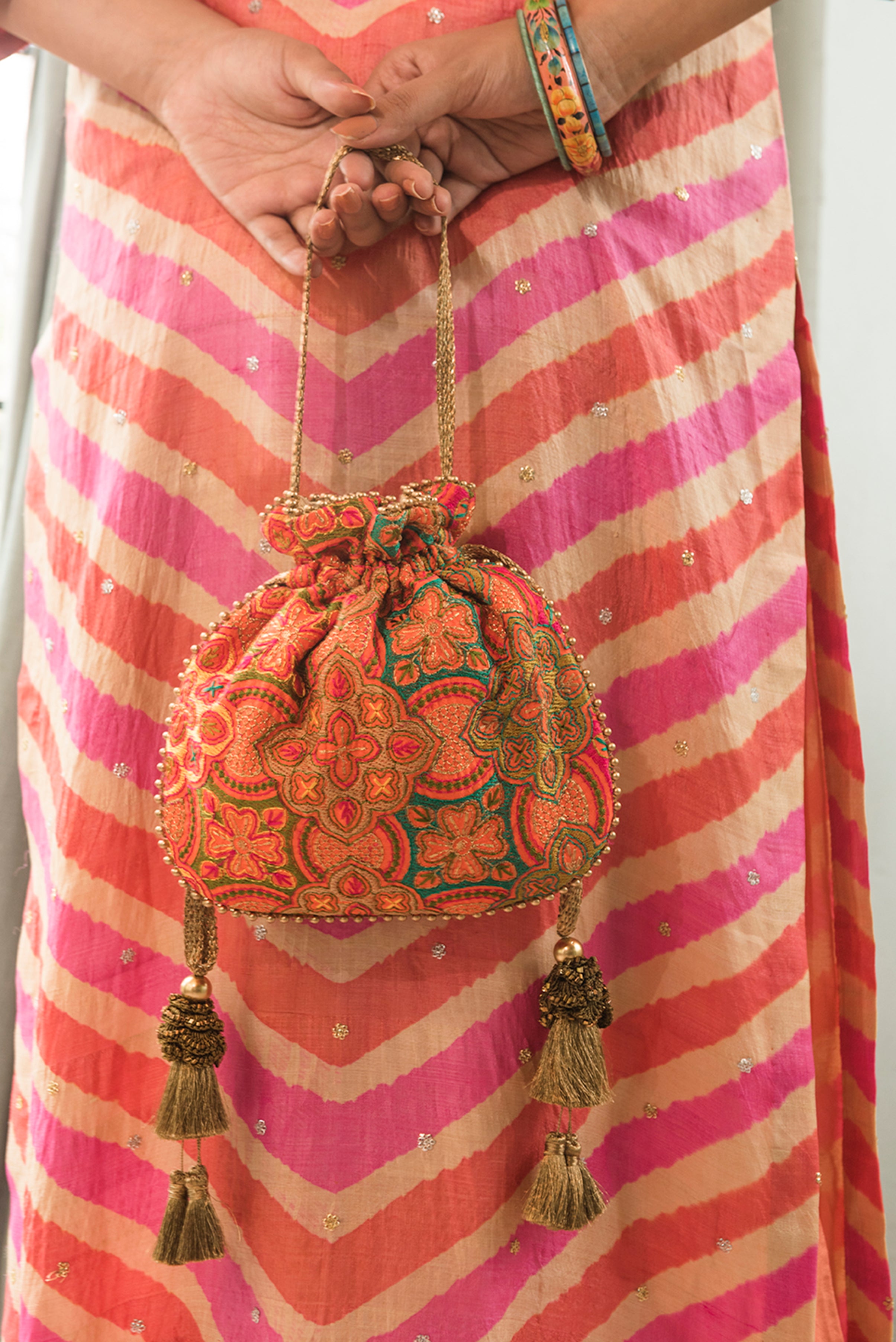 Amna Embroidered Potli Bag Orange