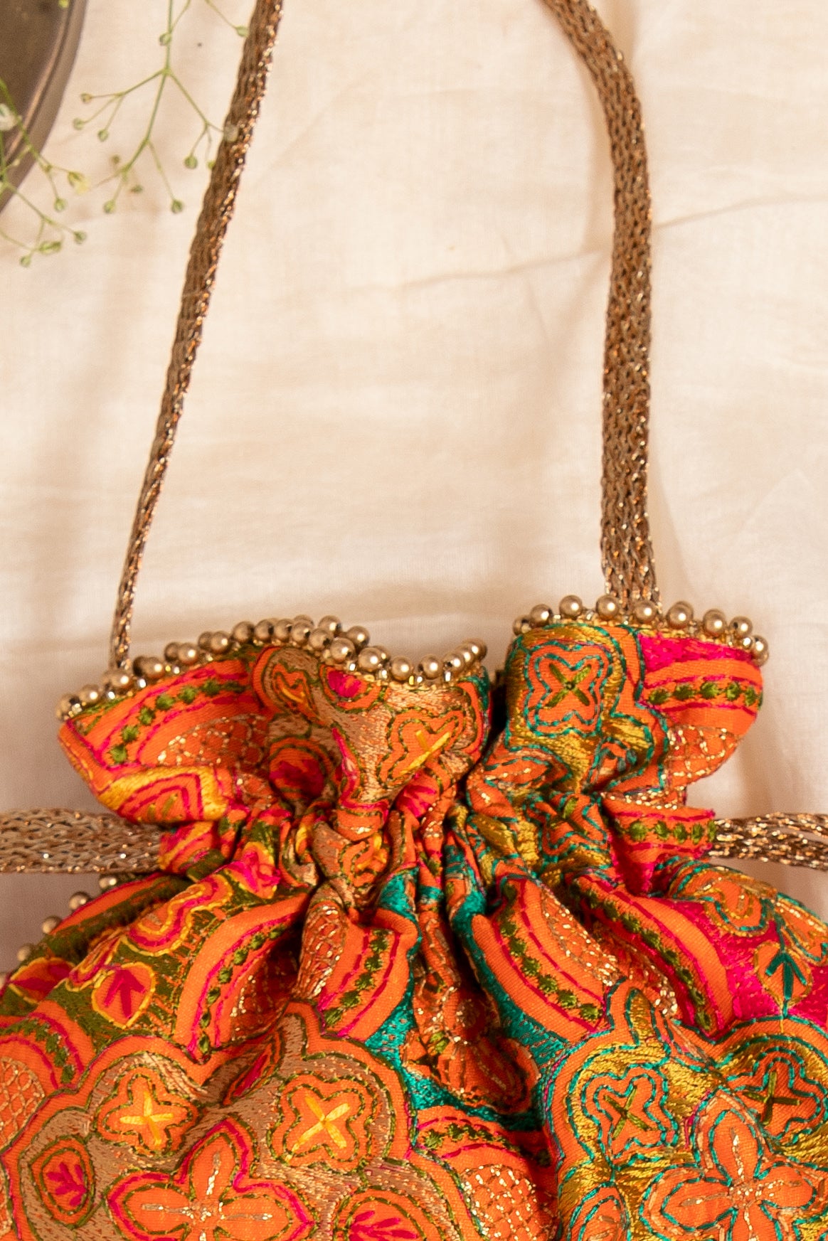 Amna Embroidered Potli Bag Orange