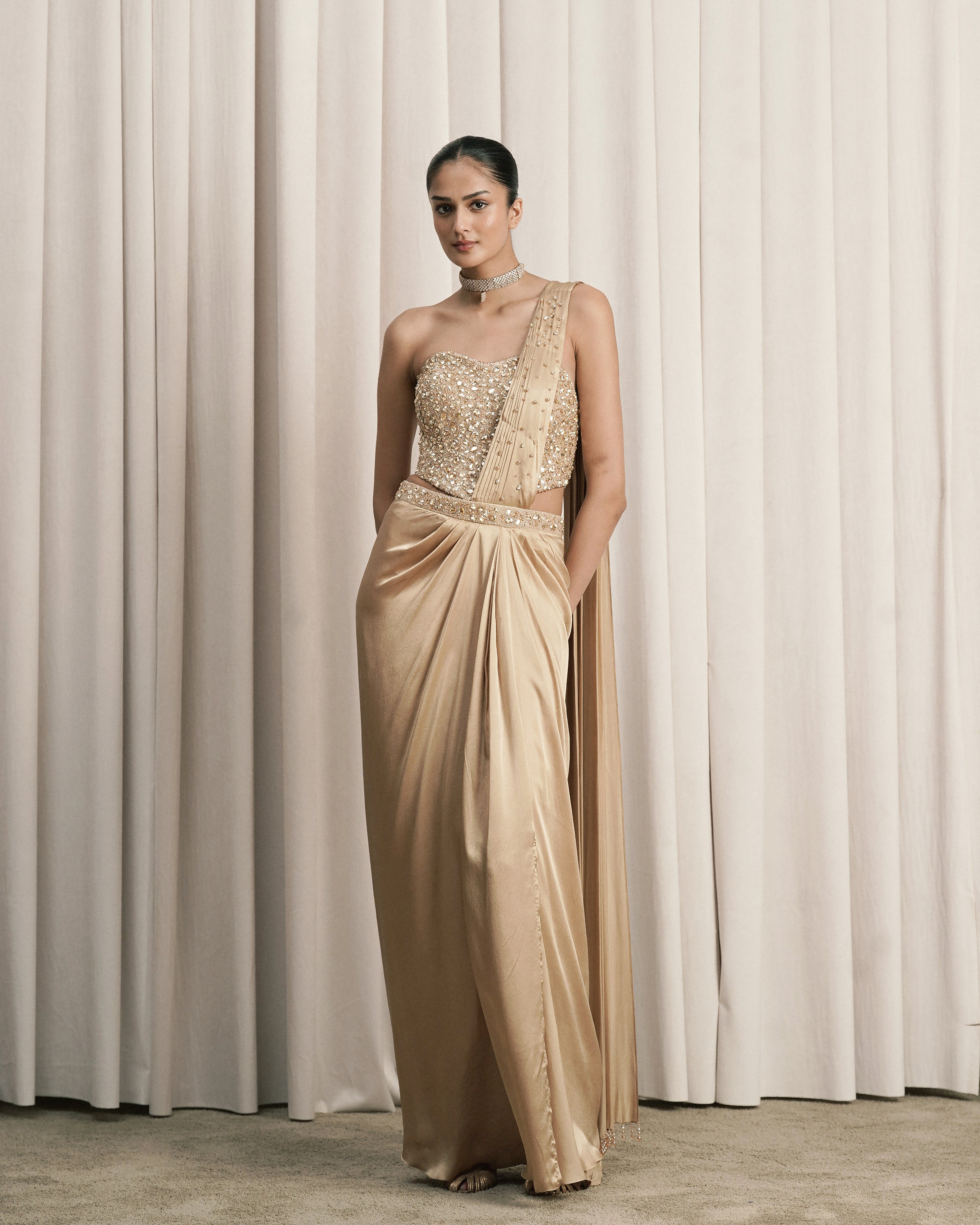 Beige Draped Saree With Embellished Corset