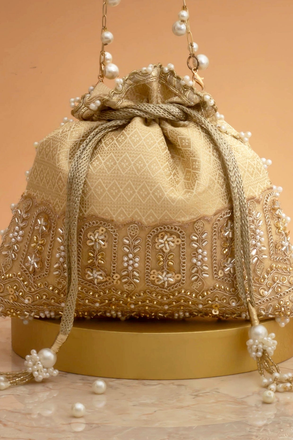 Geet Brocade Embellished Potli - Cream