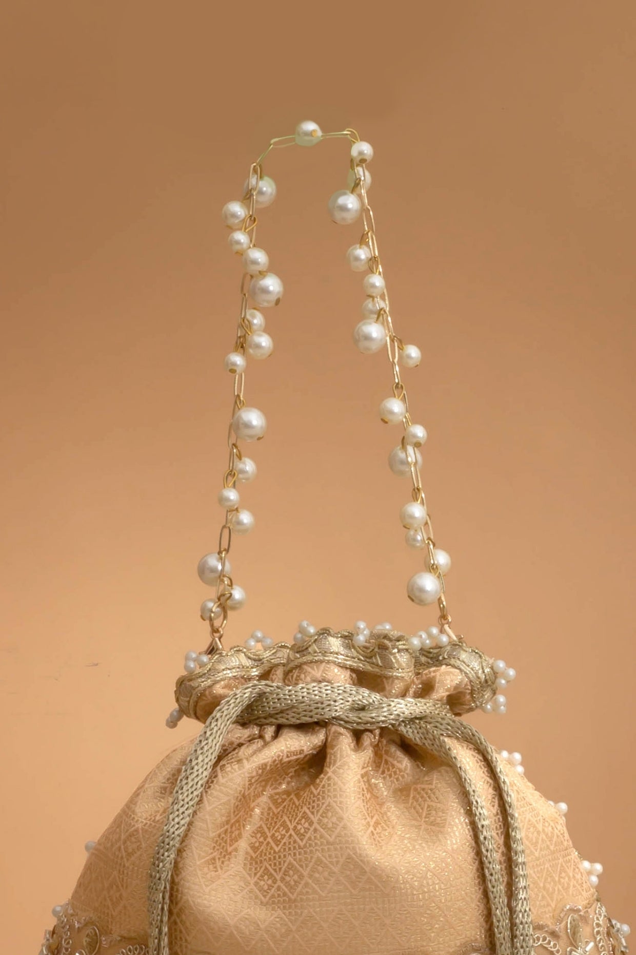 Geet Brocade Embellished Potli - Peach