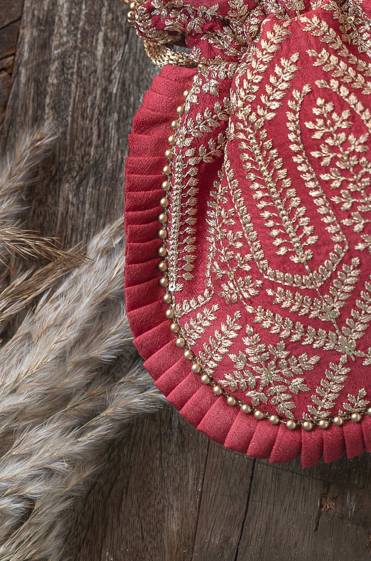 Leela Heritage Potli Maroon