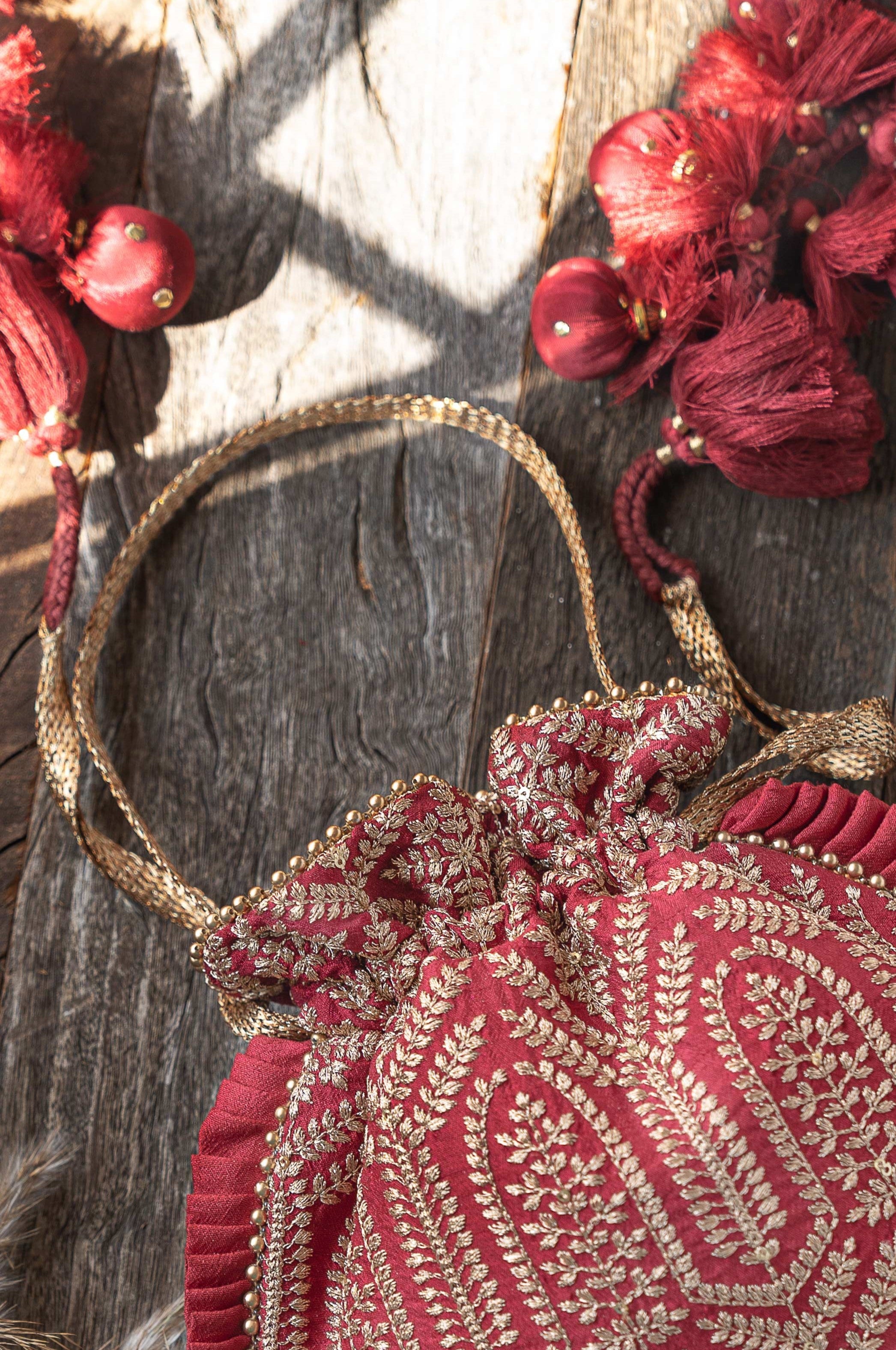 Leela Heritage Potli Maroon