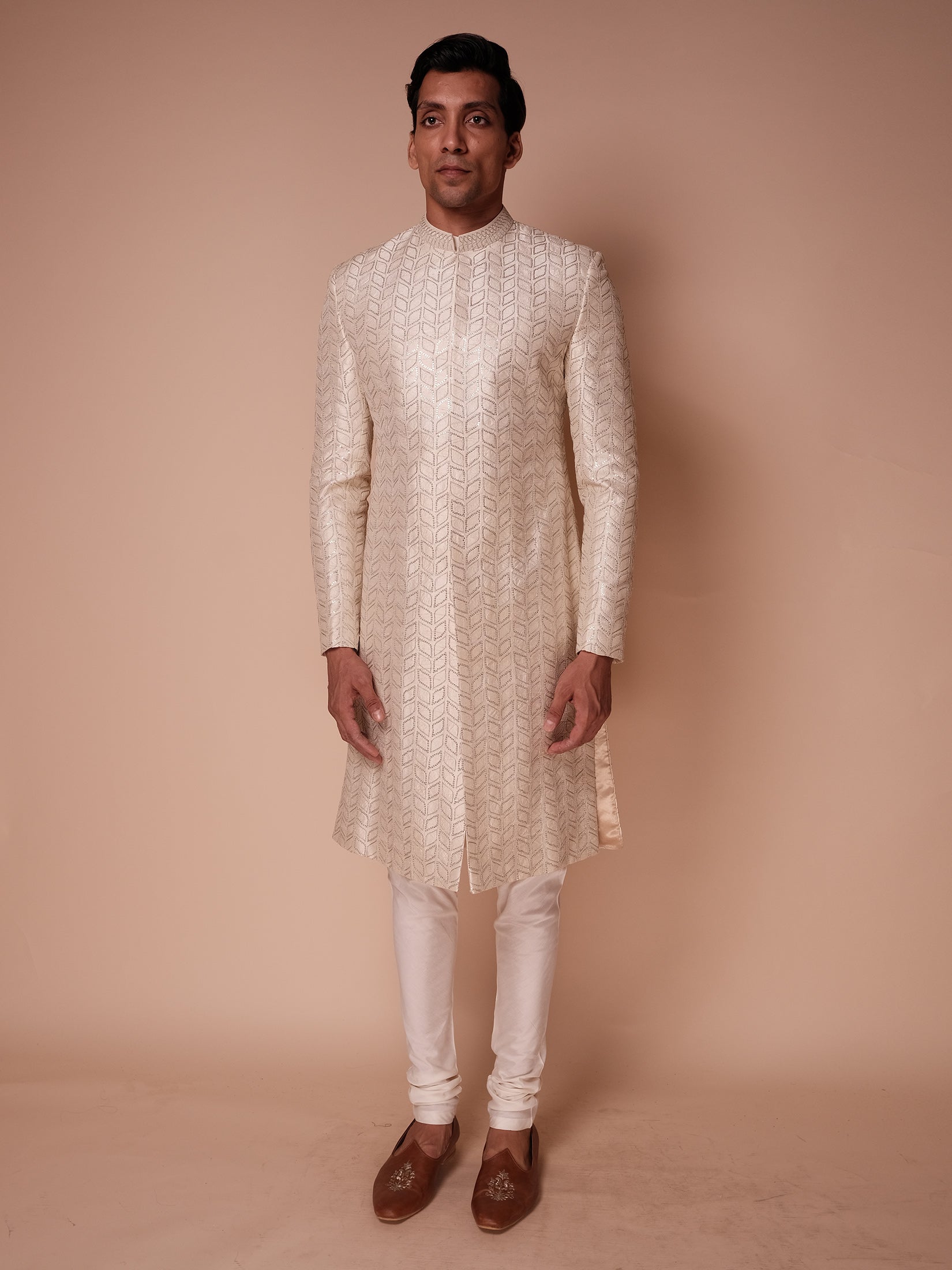 Ivory Sherwani With All Over Embroidered Sequin Leaf Motif Paired With Kurta And Churidar