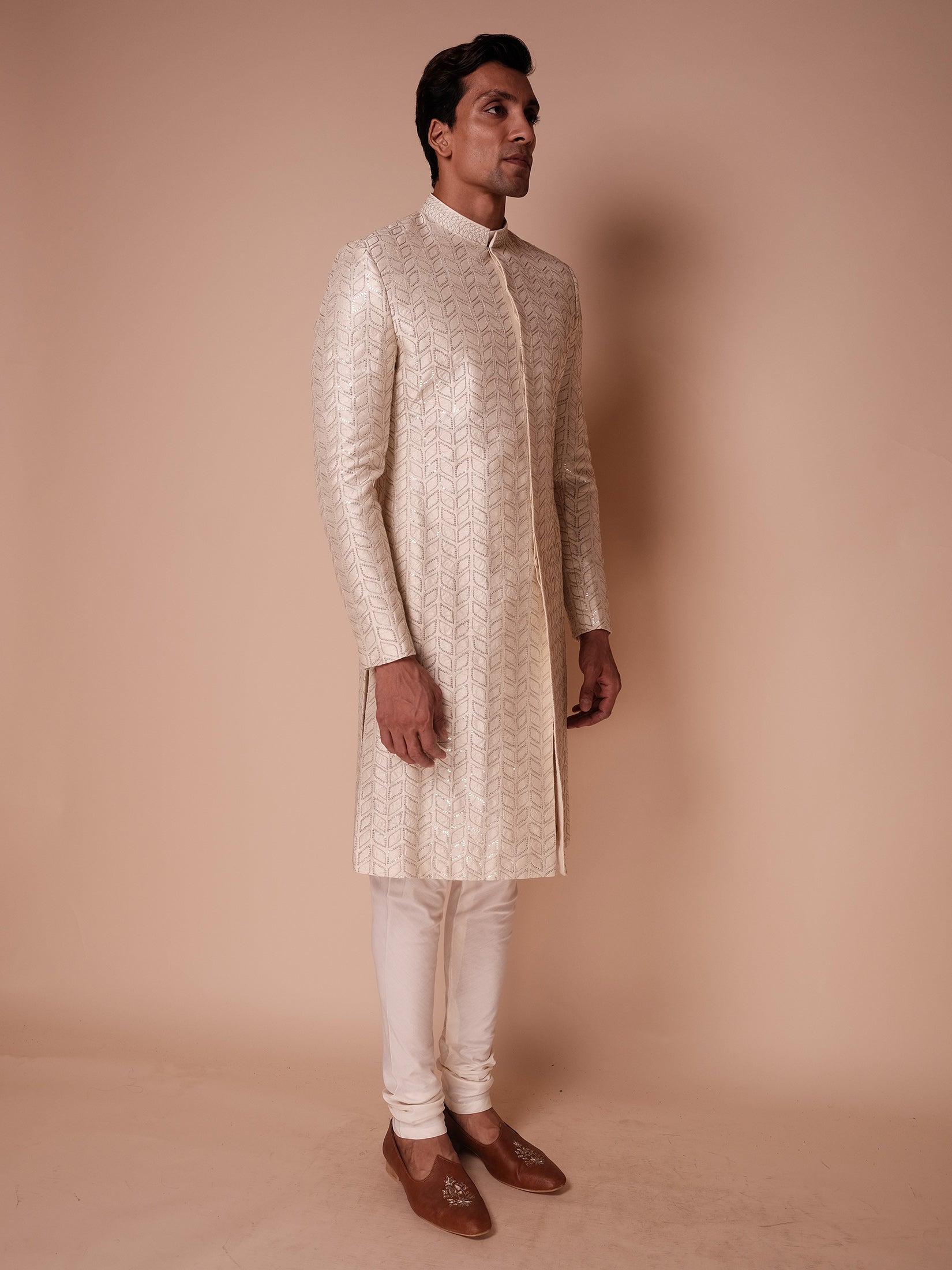 Ivory Sherwani With All Over Embroidered Sequin Leaf Motif Paired With Kurta And Churidar
