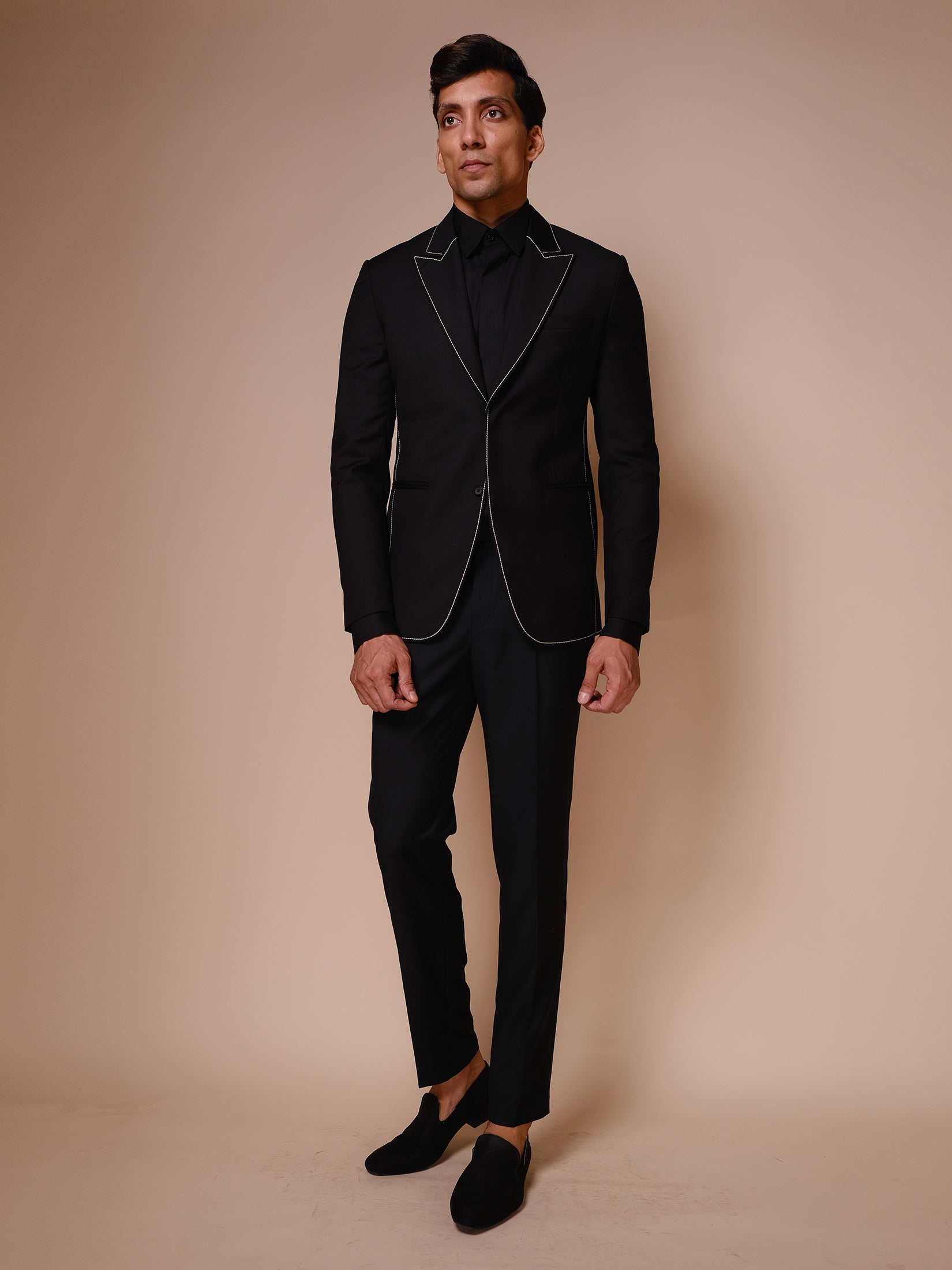 Black Peak Lapel Suit With All Over White Outline  Paired With Trousers And Tonal Shirt