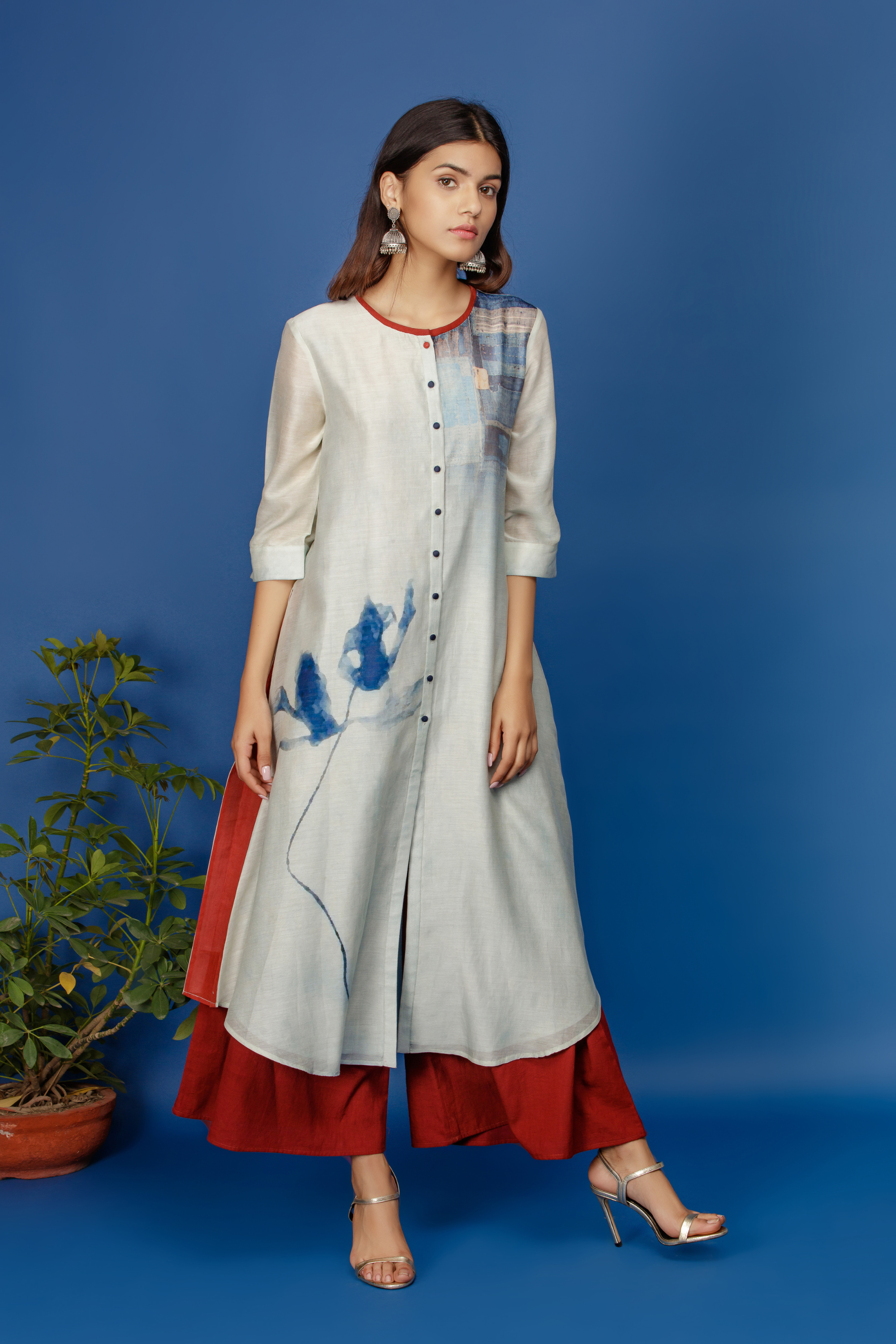 Floral & Abstract Printed Ivory Kurta With Trim On Neck Line