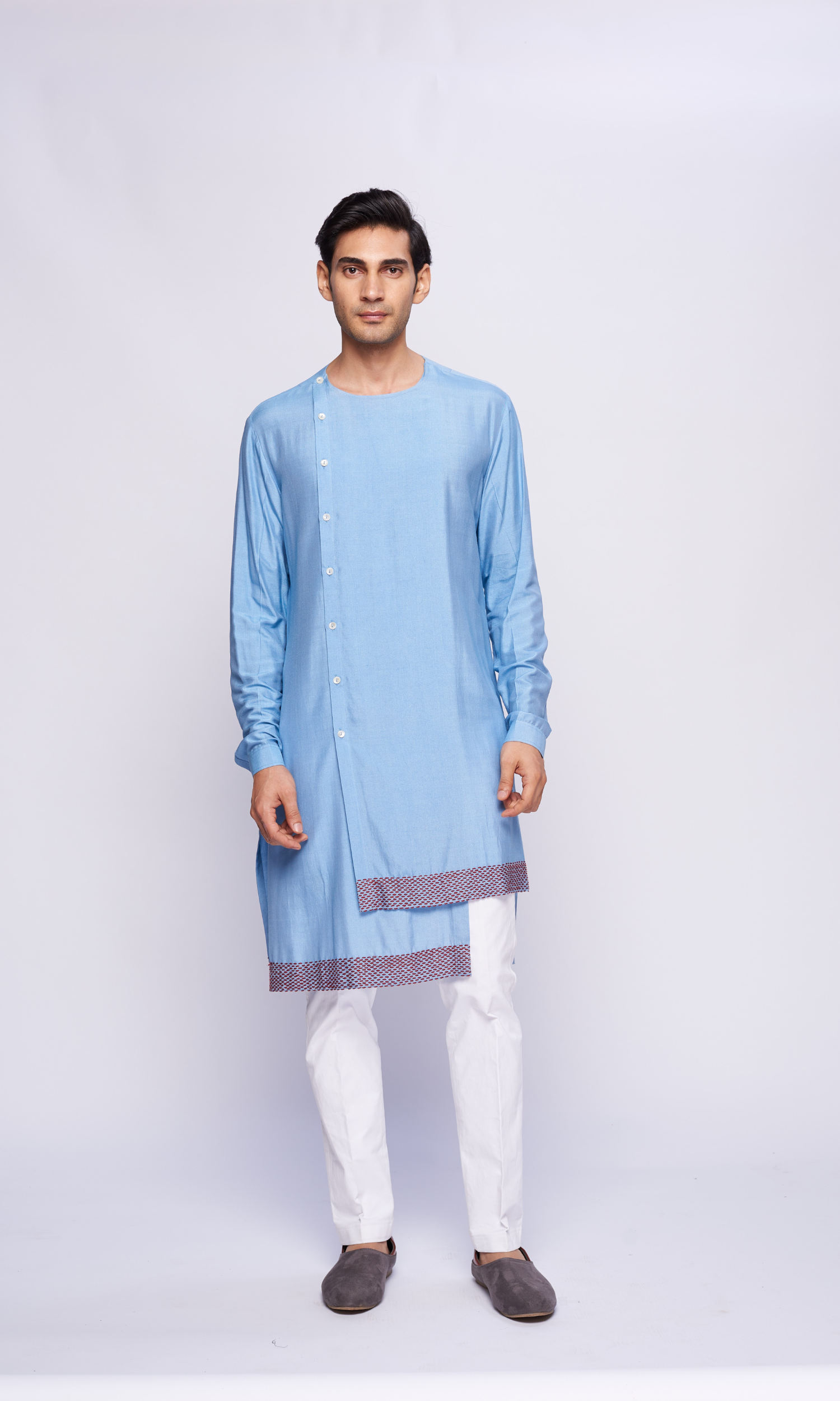 Powder blue asymmetrical kurta with pick stitch emb on hem