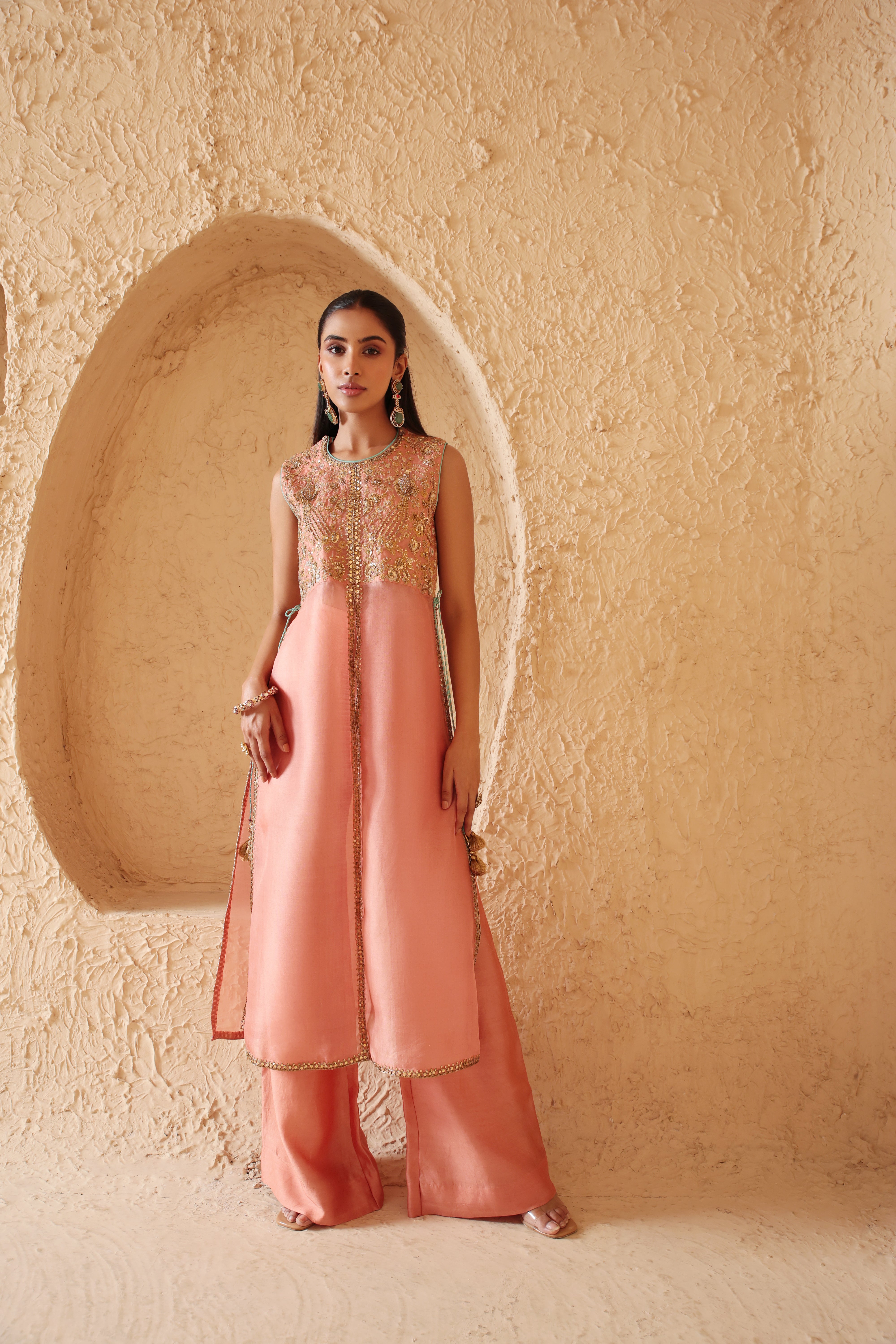 Mehrang Peach Tie-up Sleeveless Kurta Set