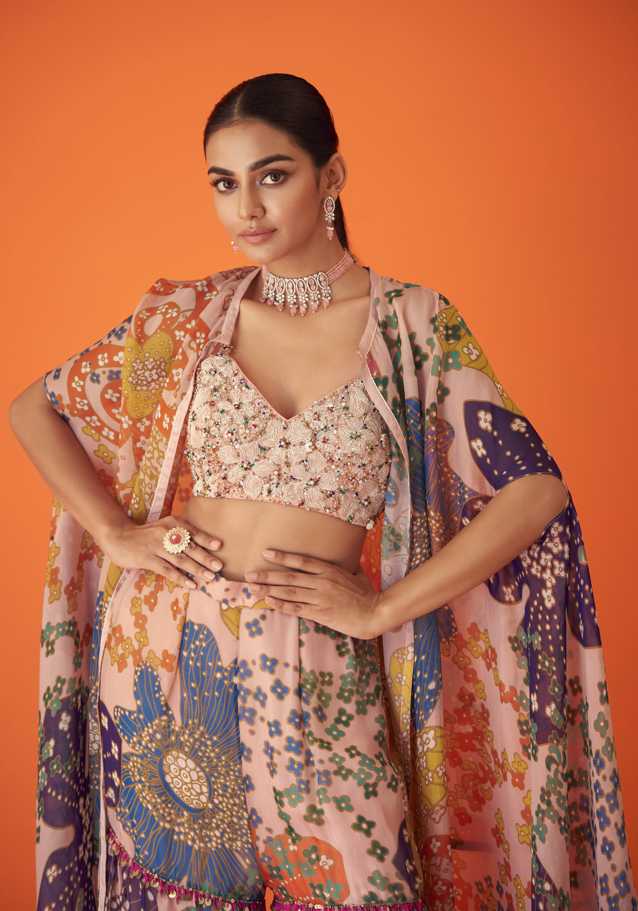 Peach Printed Organza Cape Paired With Sharara Pants And Embellished Bustier