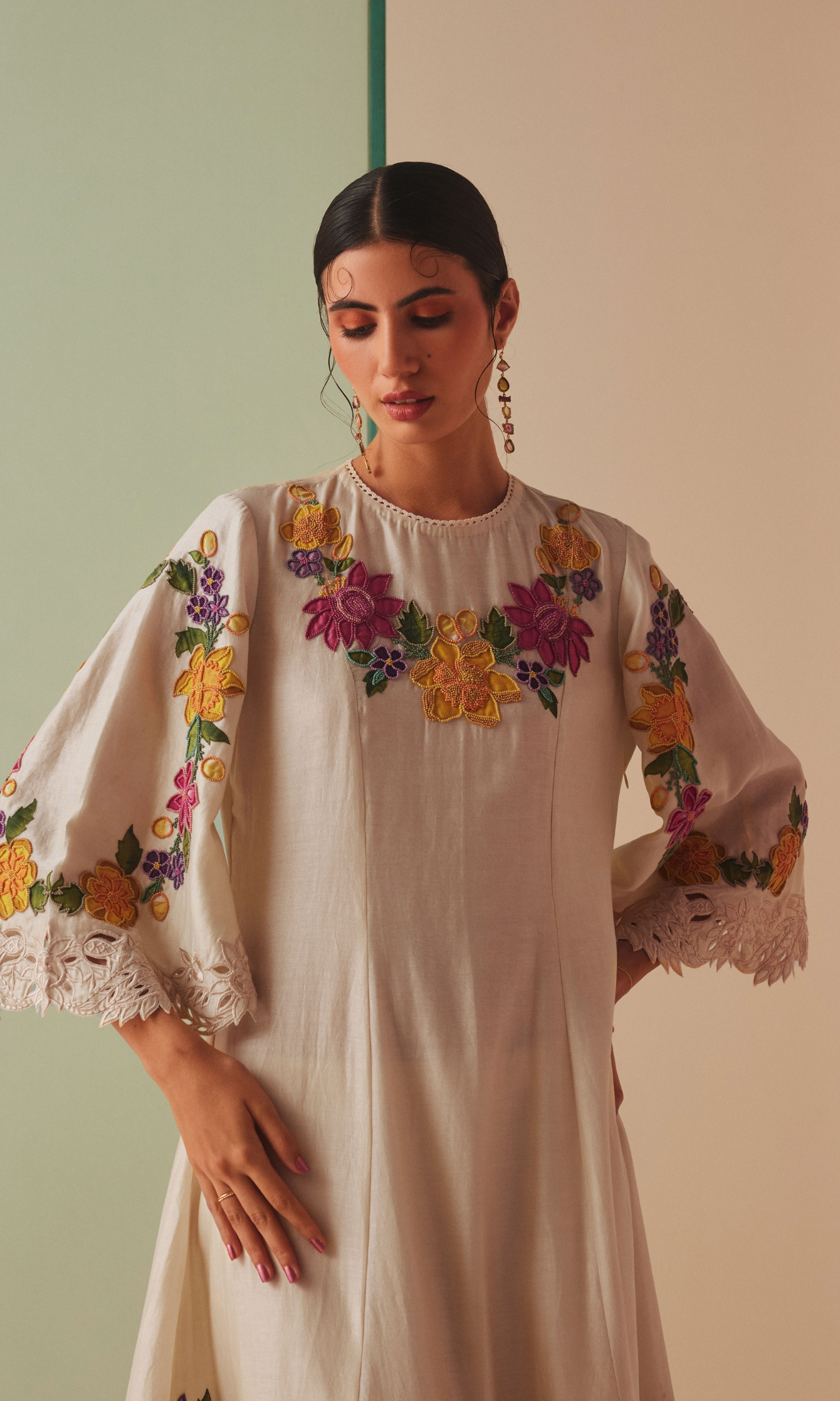 Ivory applique and cutwork flared kurta with narrow cutwork pants