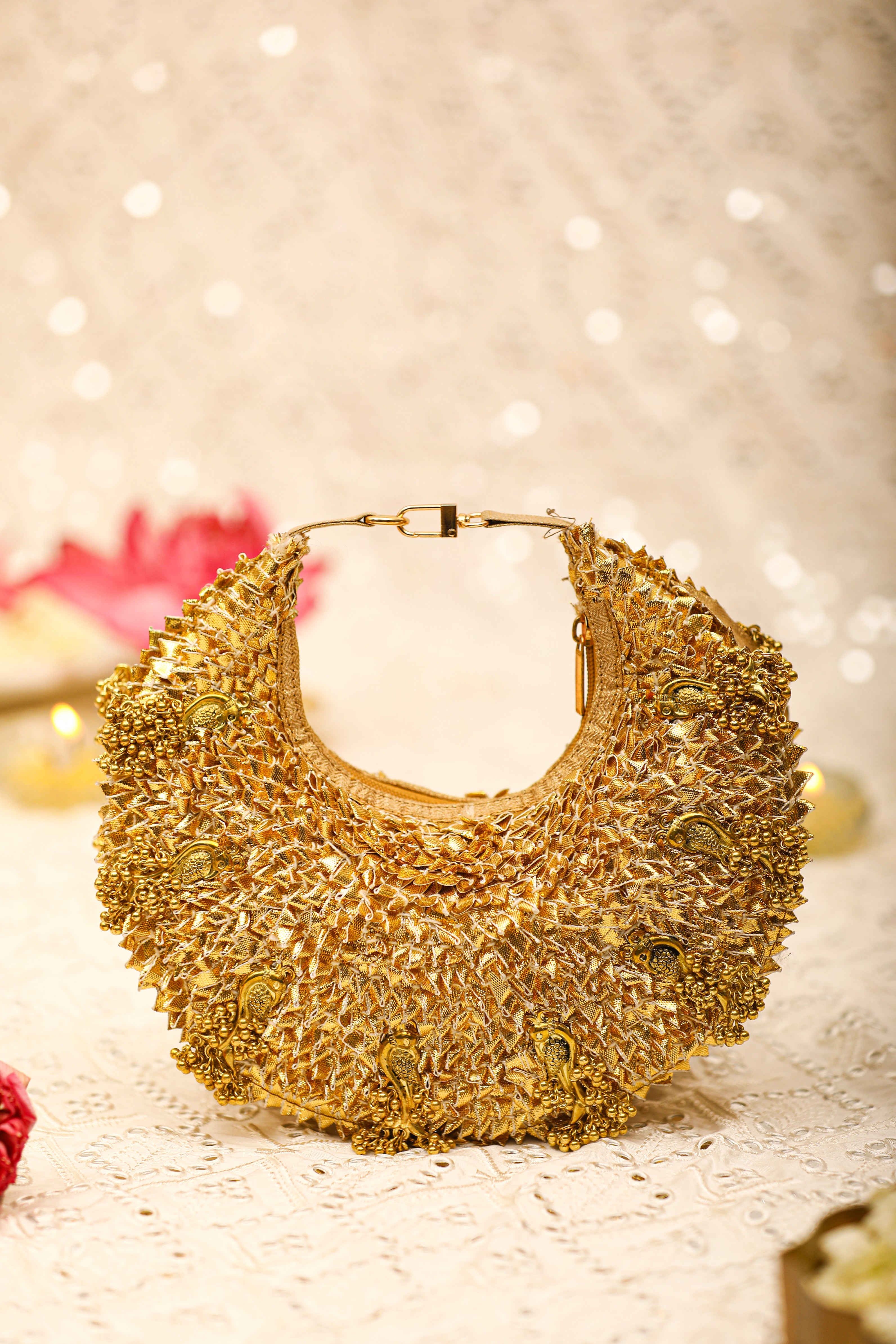 Ishani -gold Handbag