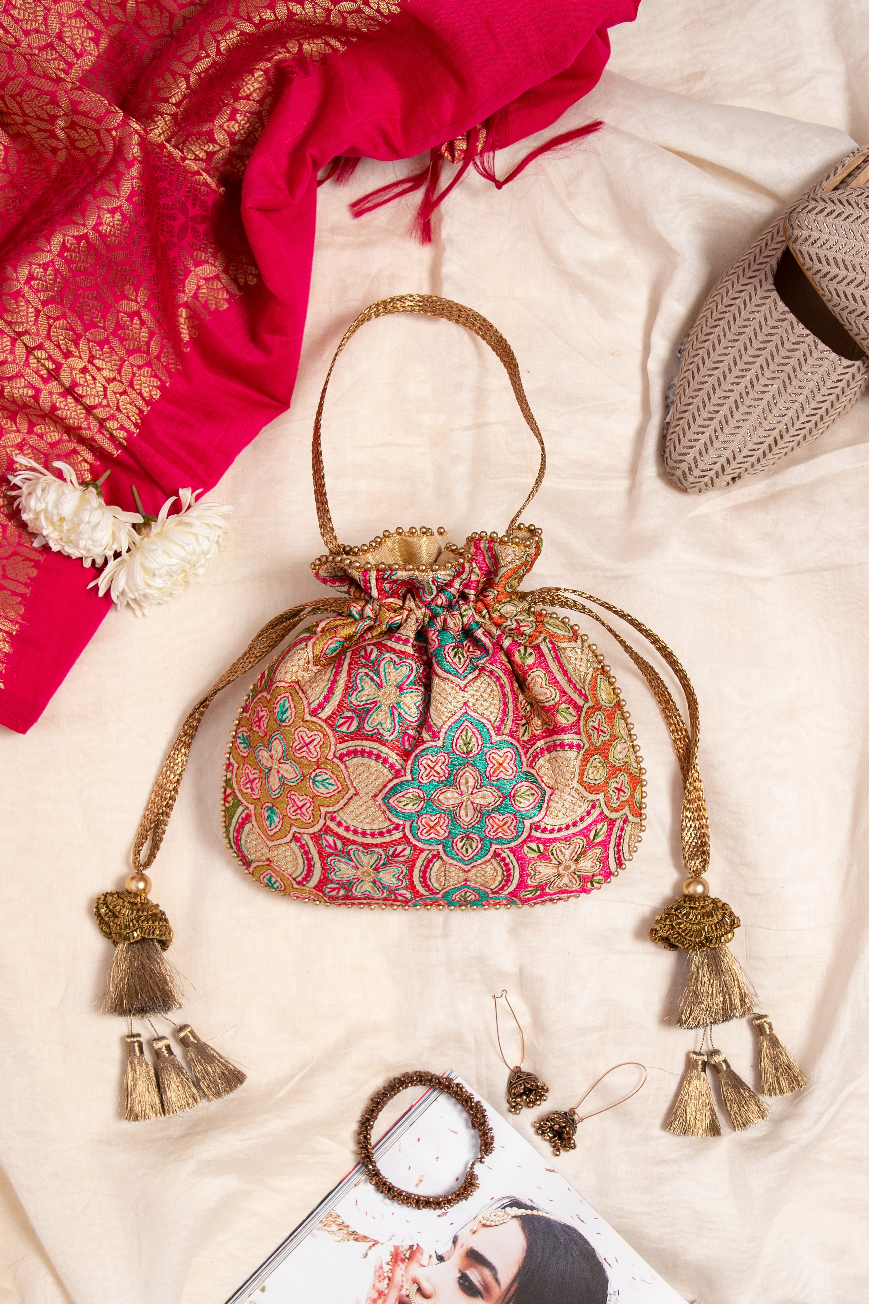 Amna Embroidered Potli Bag Cream