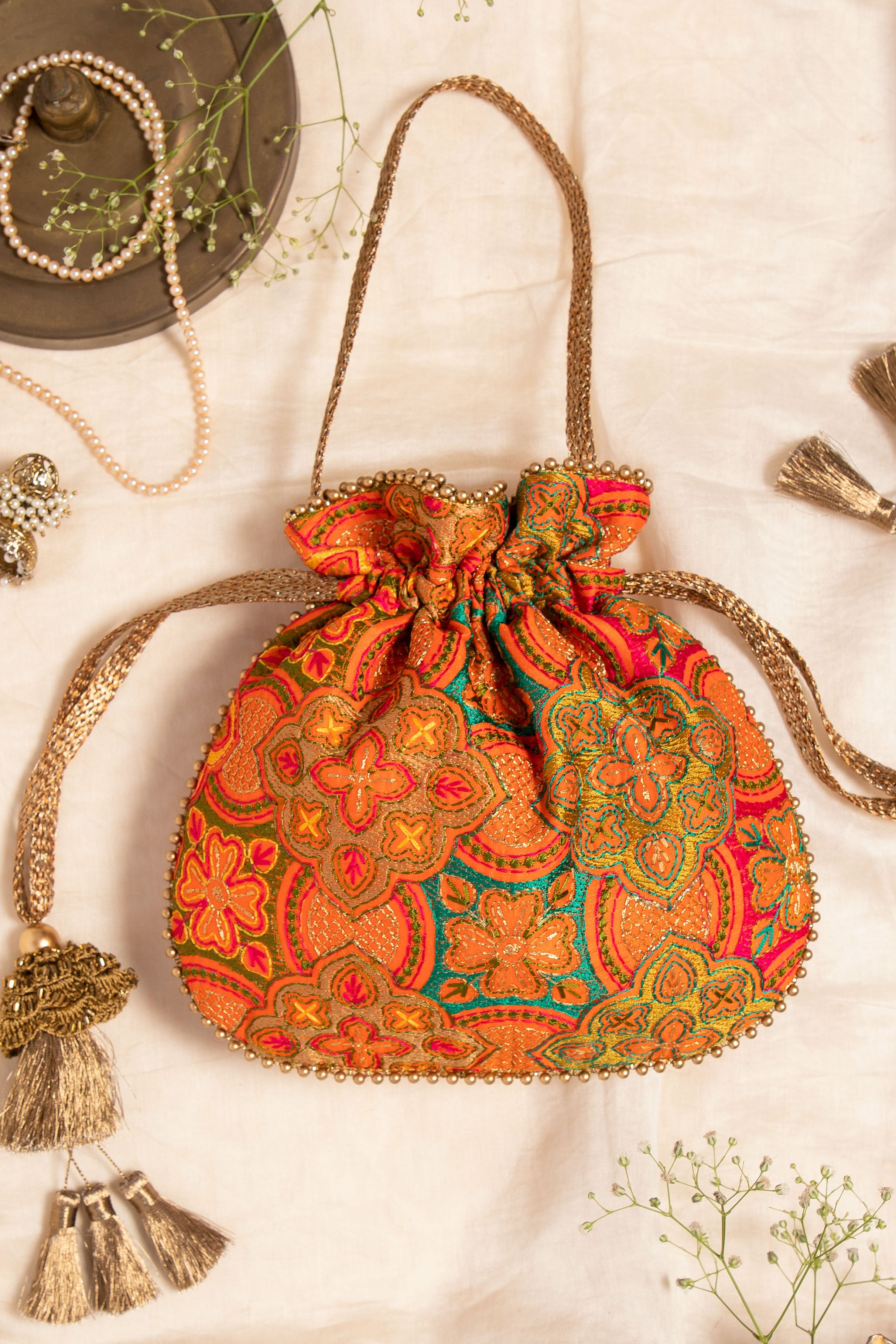 Amna Embroidered Potli Bag Orange