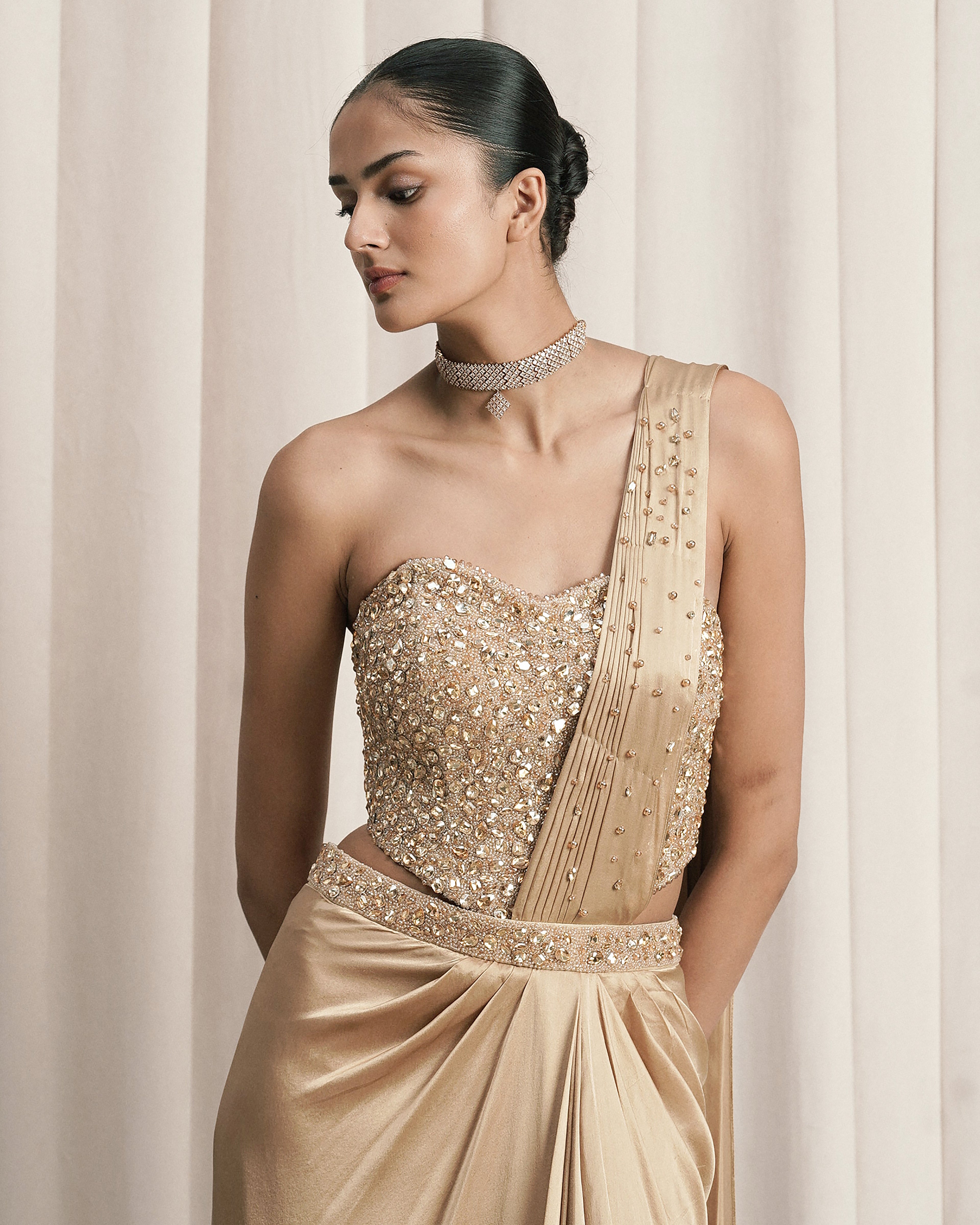 Beige Draped Saree With Embellished Corset