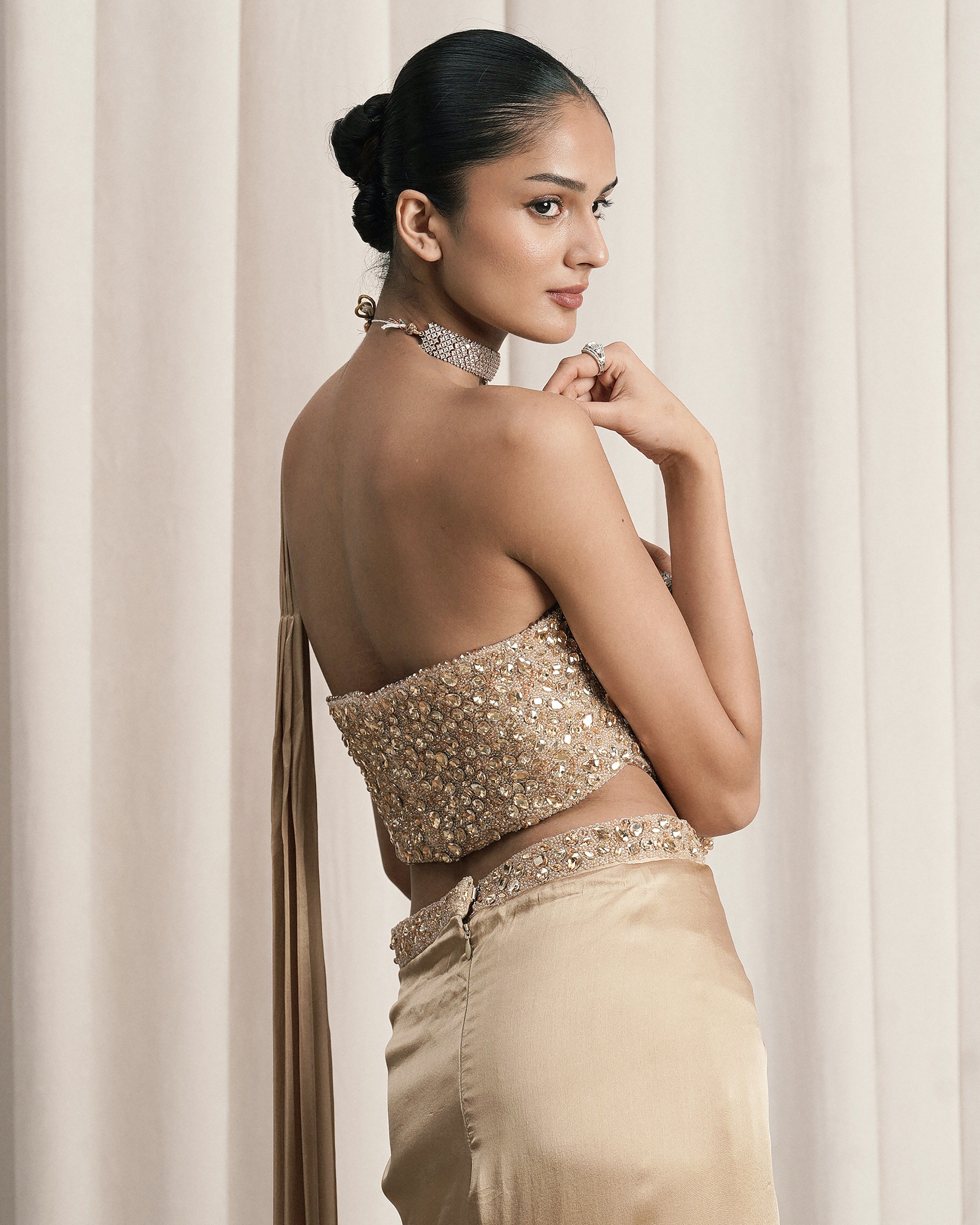 Beige Draped Saree With Embellished Corset