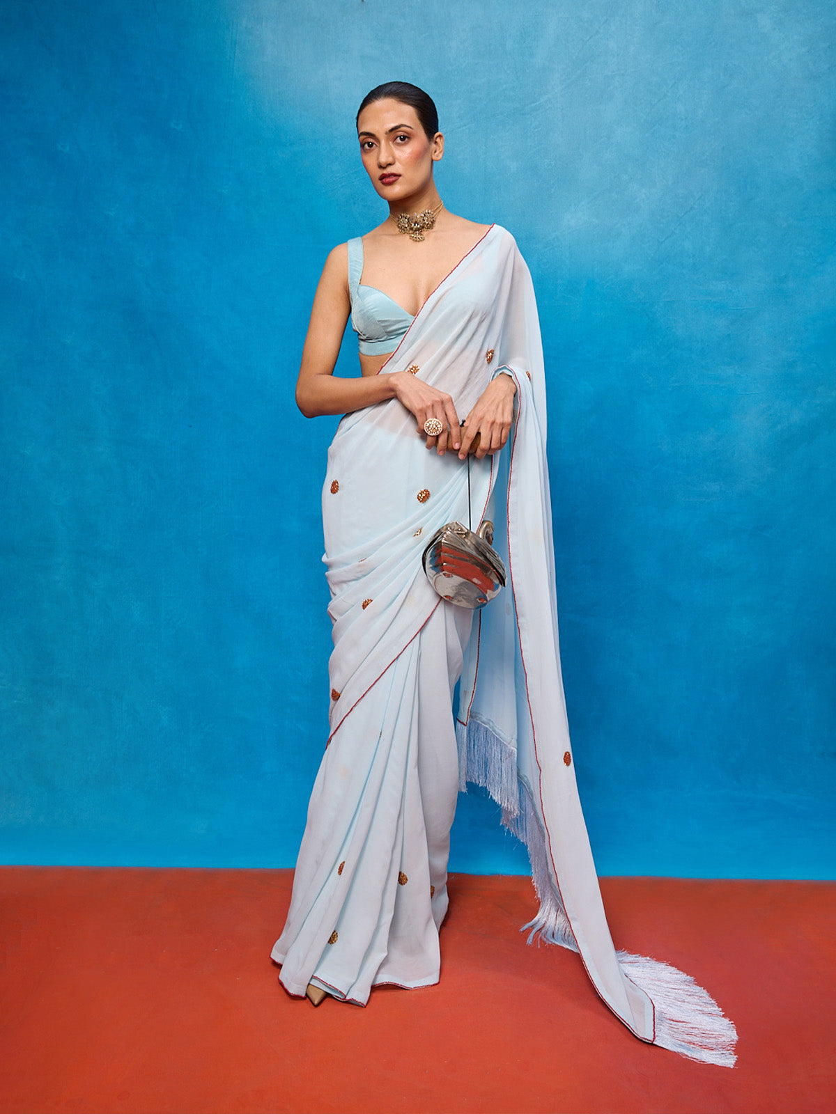 Handwoven Ice Blue Georgette Embroidered Saree
