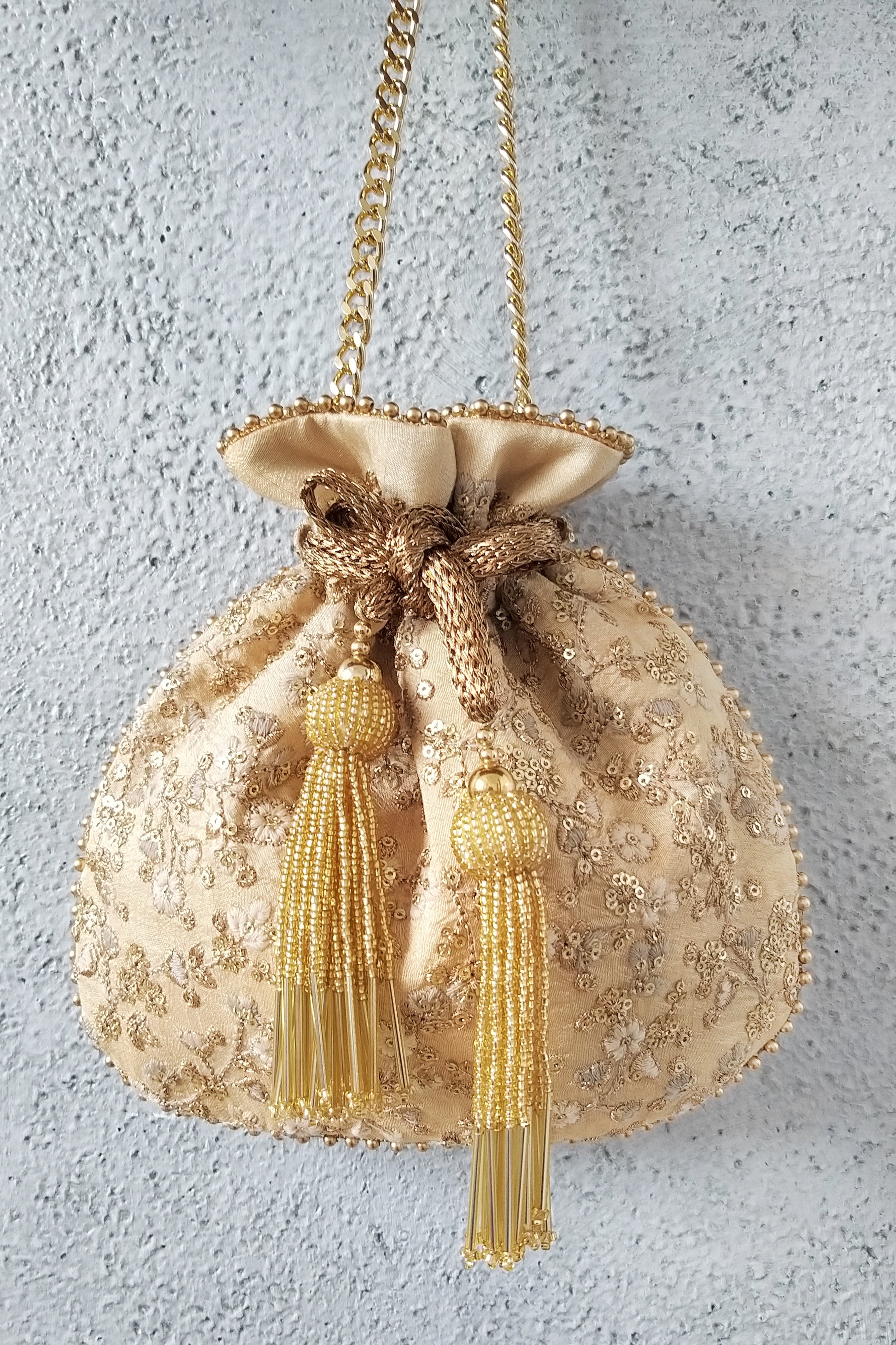 Golden potli bags discount online