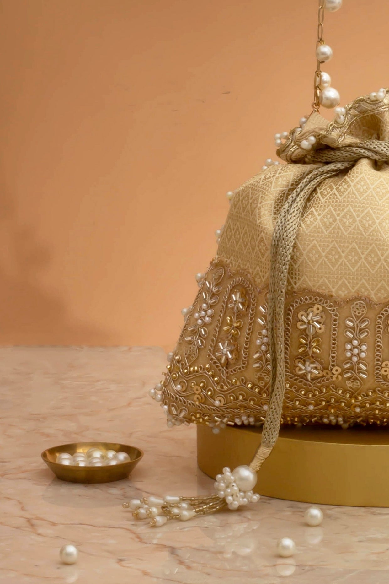 Geet Brocade Embellished Potli - Cream
