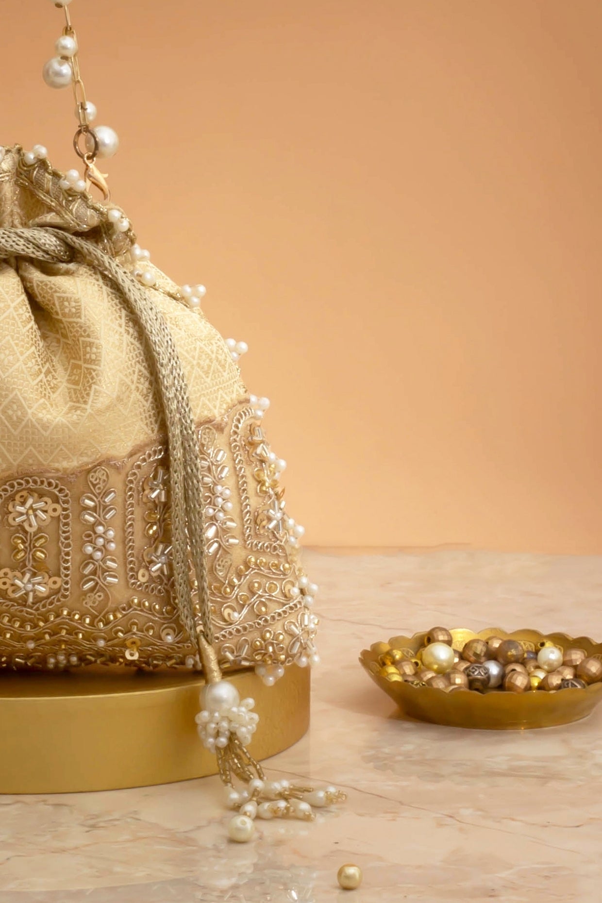 Geet Brocade Embellished Potli - Cream