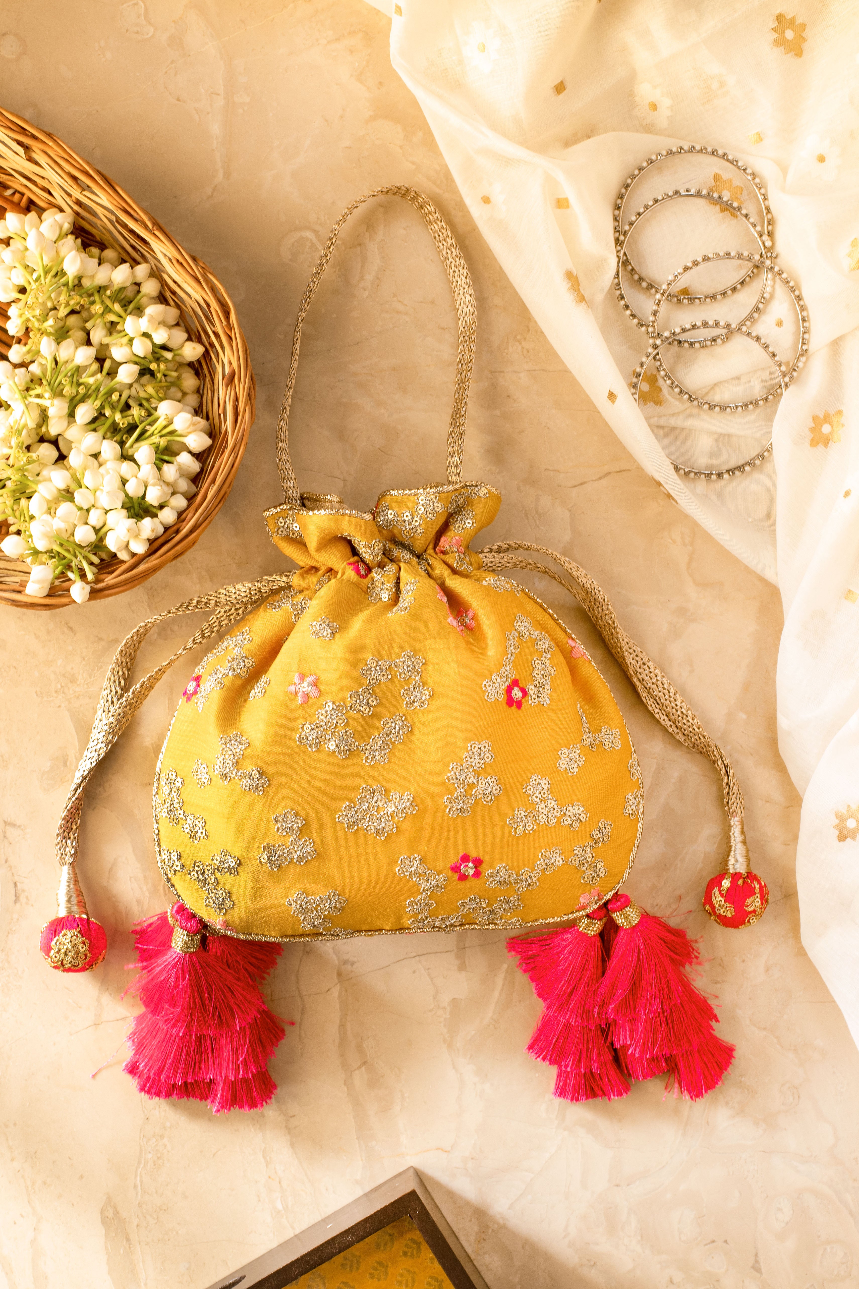 Azalea Yellow And Hot Pink Tassle Potli Bag