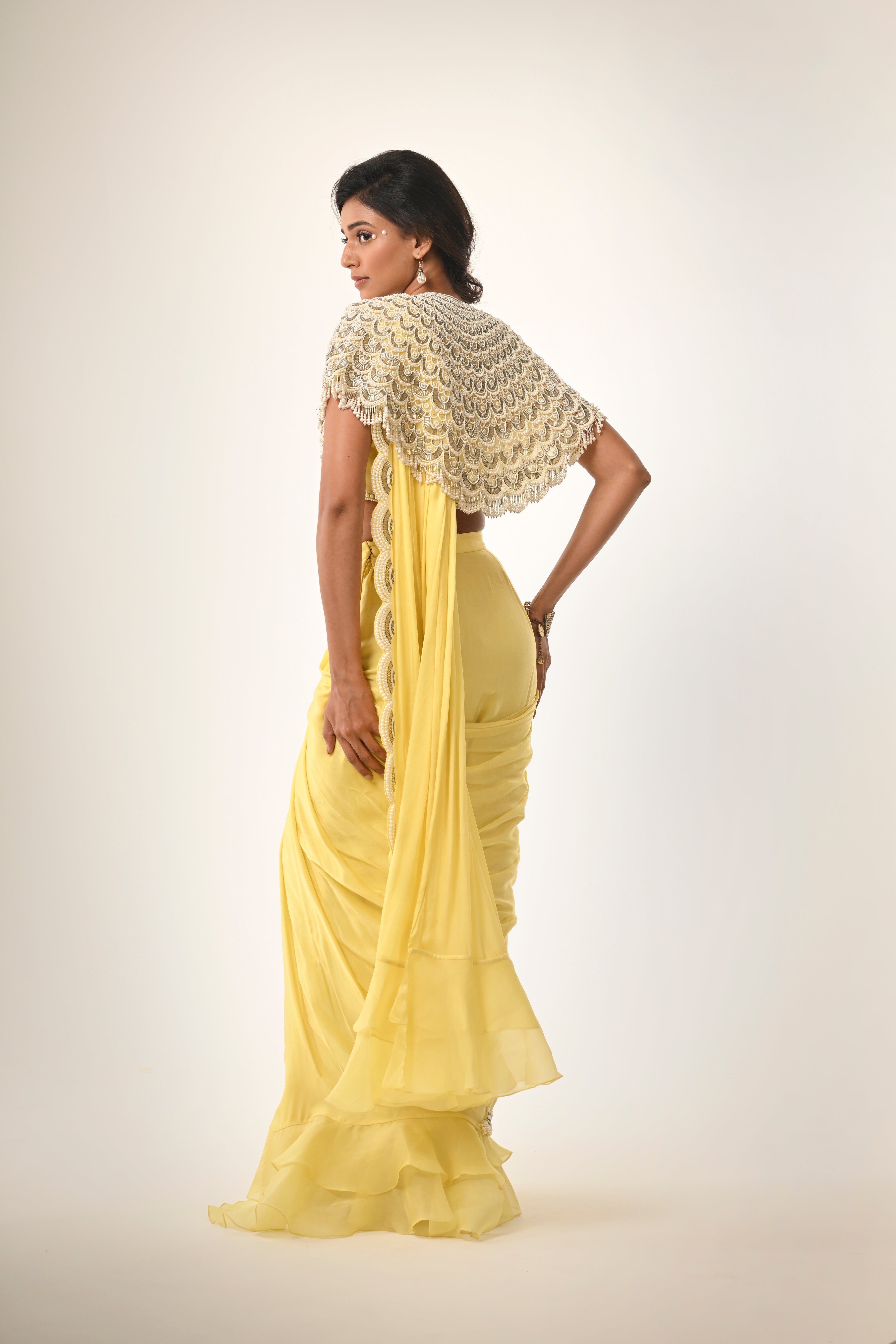 Yellow Saree With Wide Border On The Edge