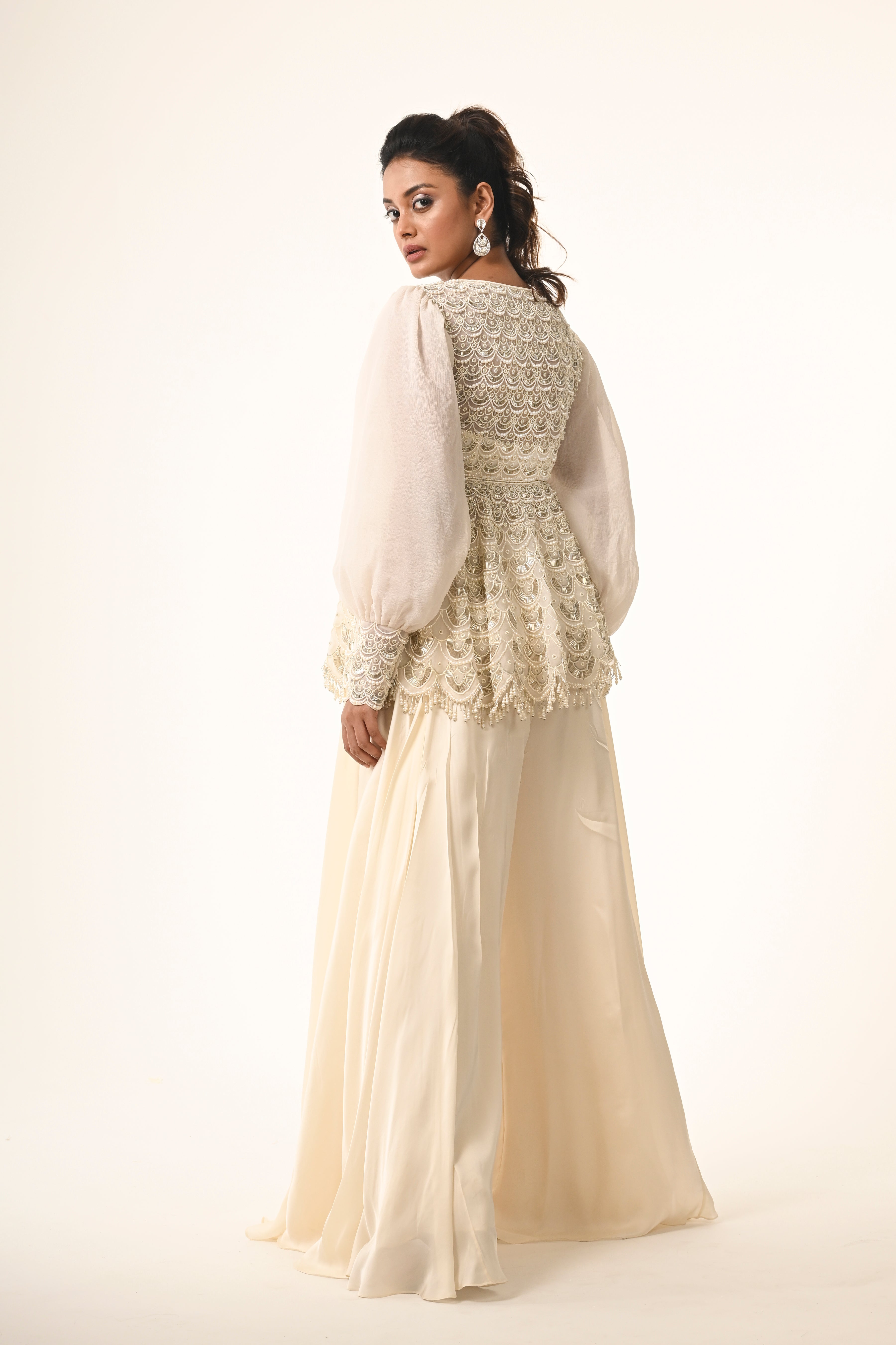 Ivory Peplum Top With Flared Pants