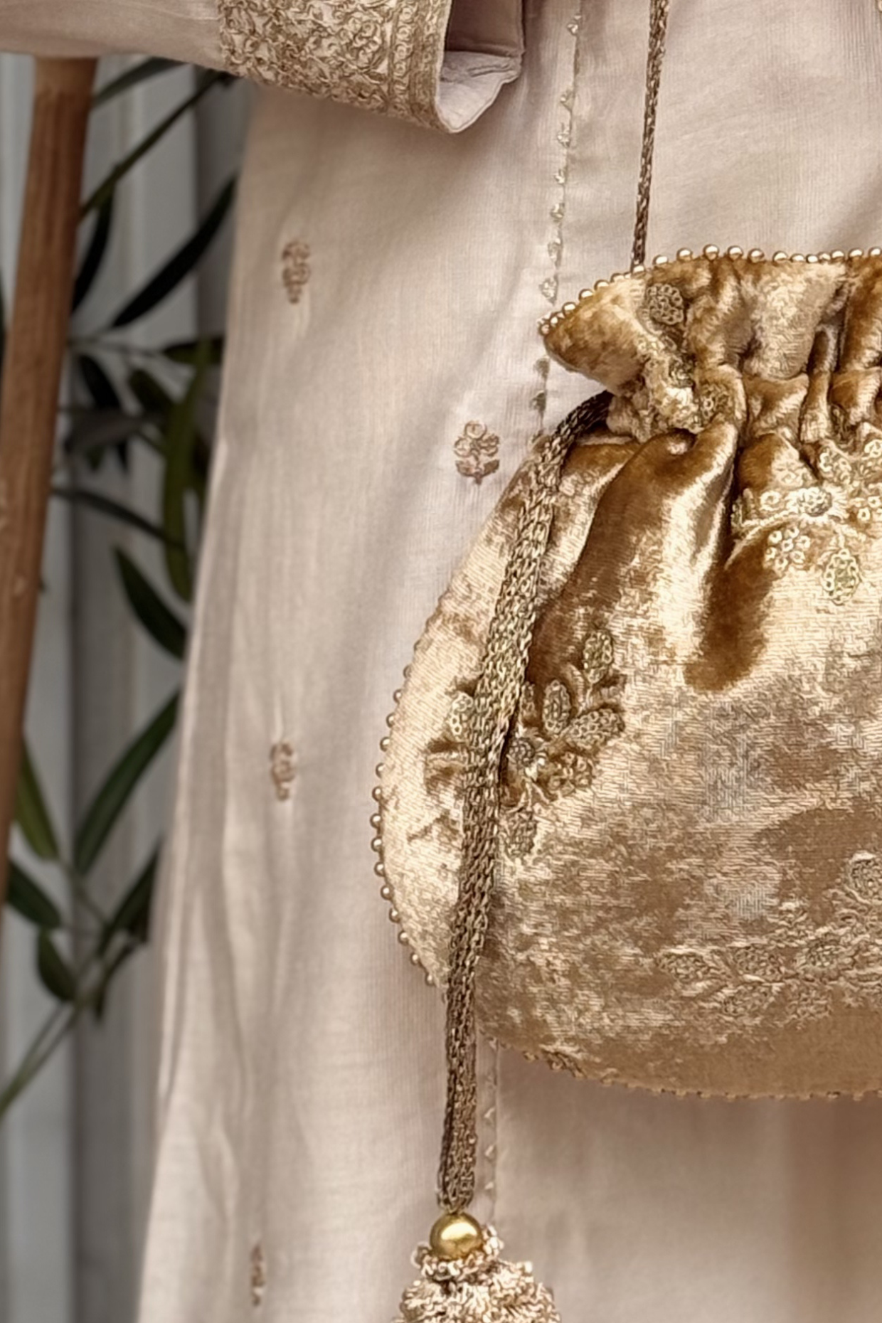Ras Velvet Embroidered Potli - Gold