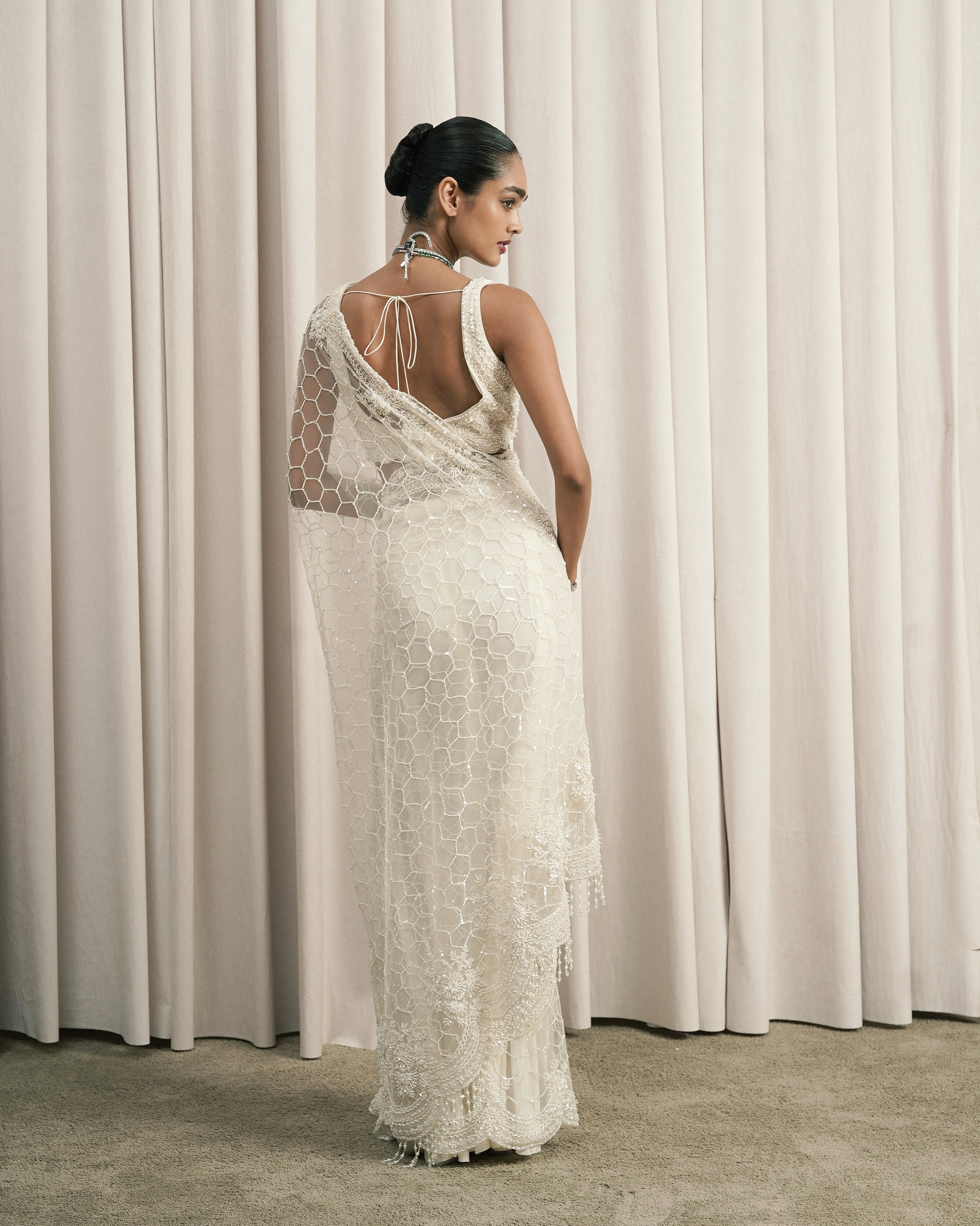 Ivory Embroidered Net Saree With Blouse