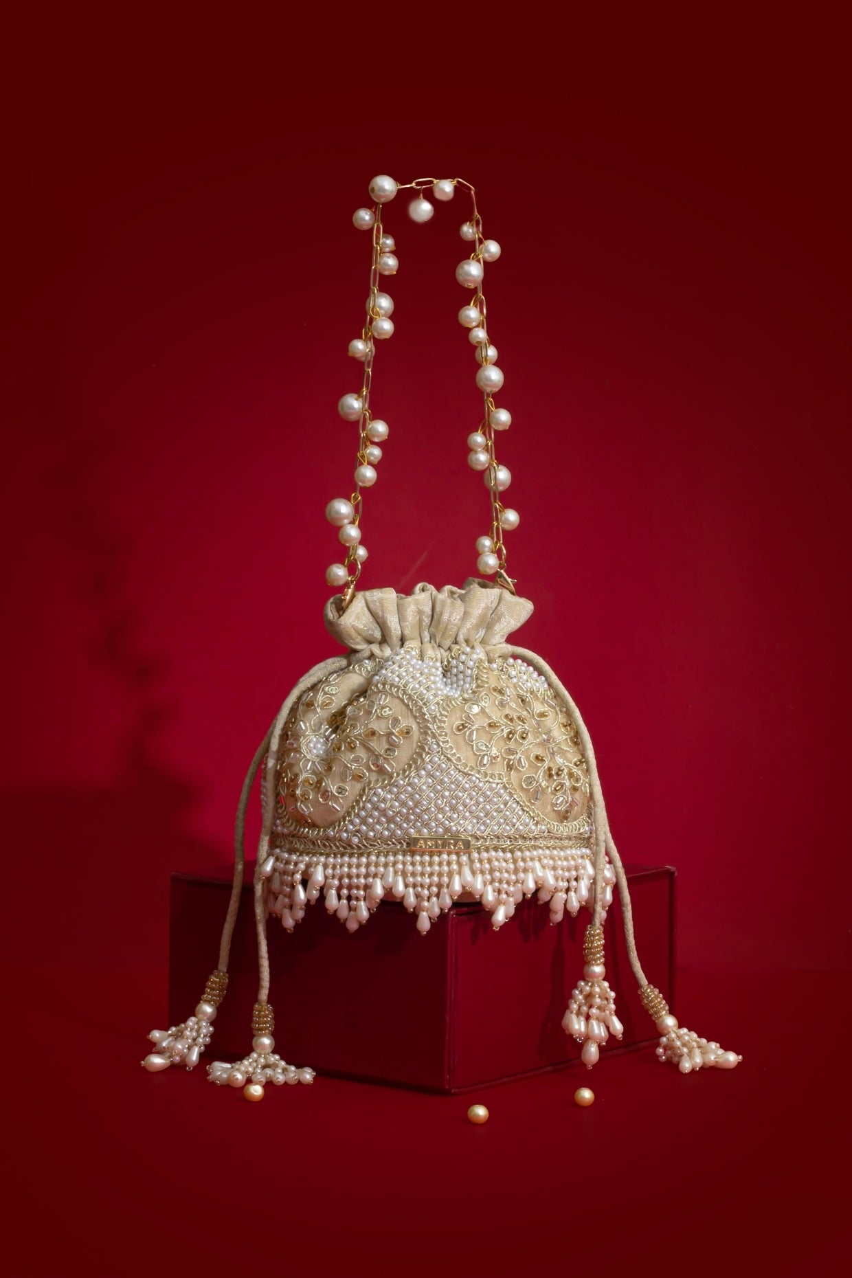 Sehra Pearl Embroidered Mini Potli - Beige
