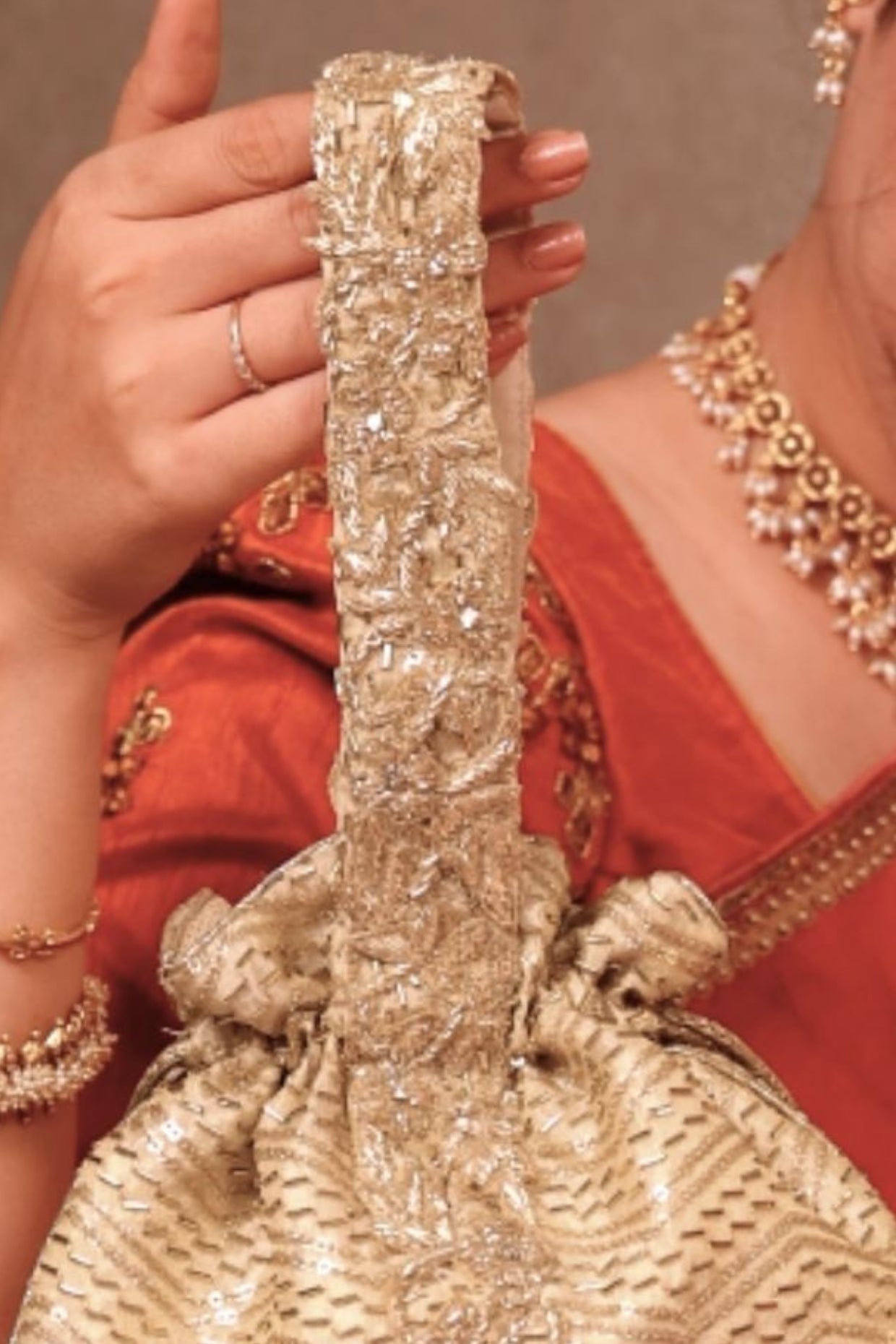 Sunehri Embroidered Top Handle Potli - Gold