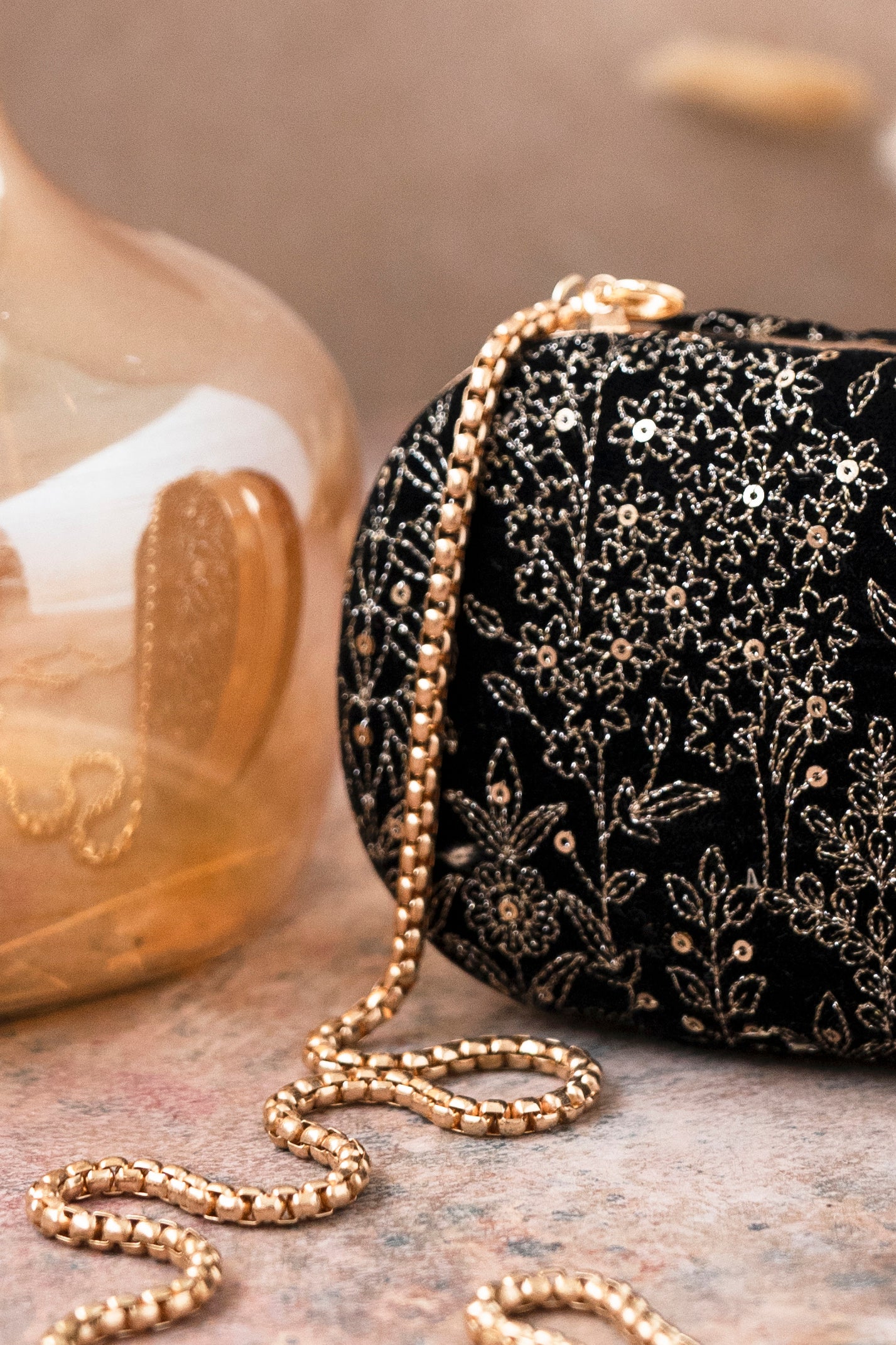 Black embroidered best sale clutch bag