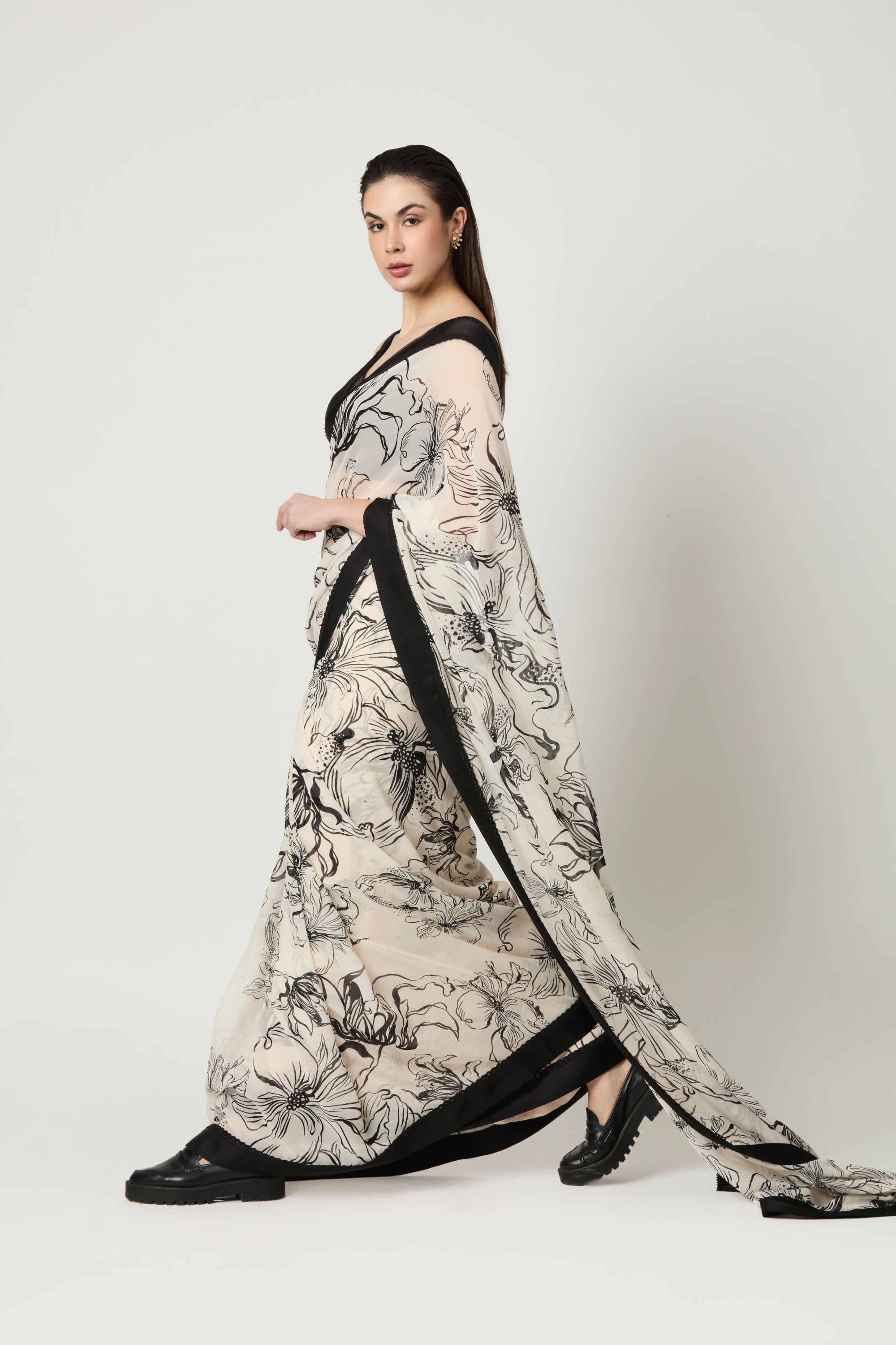 Luna All Over Printed Saree With Plunging V Neck Blouse