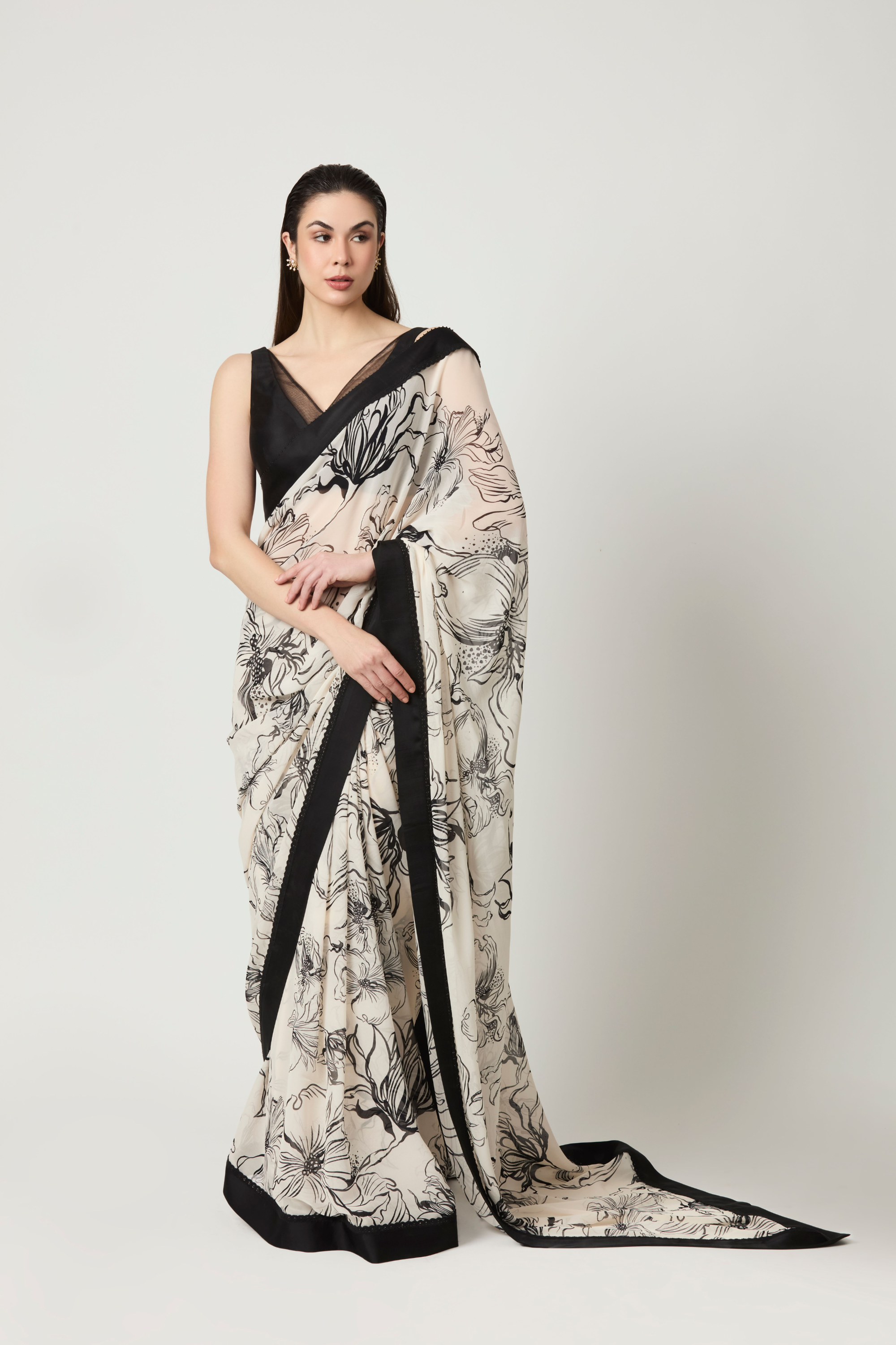Luna All Over Printed Saree With Plunging V Neck Blouse