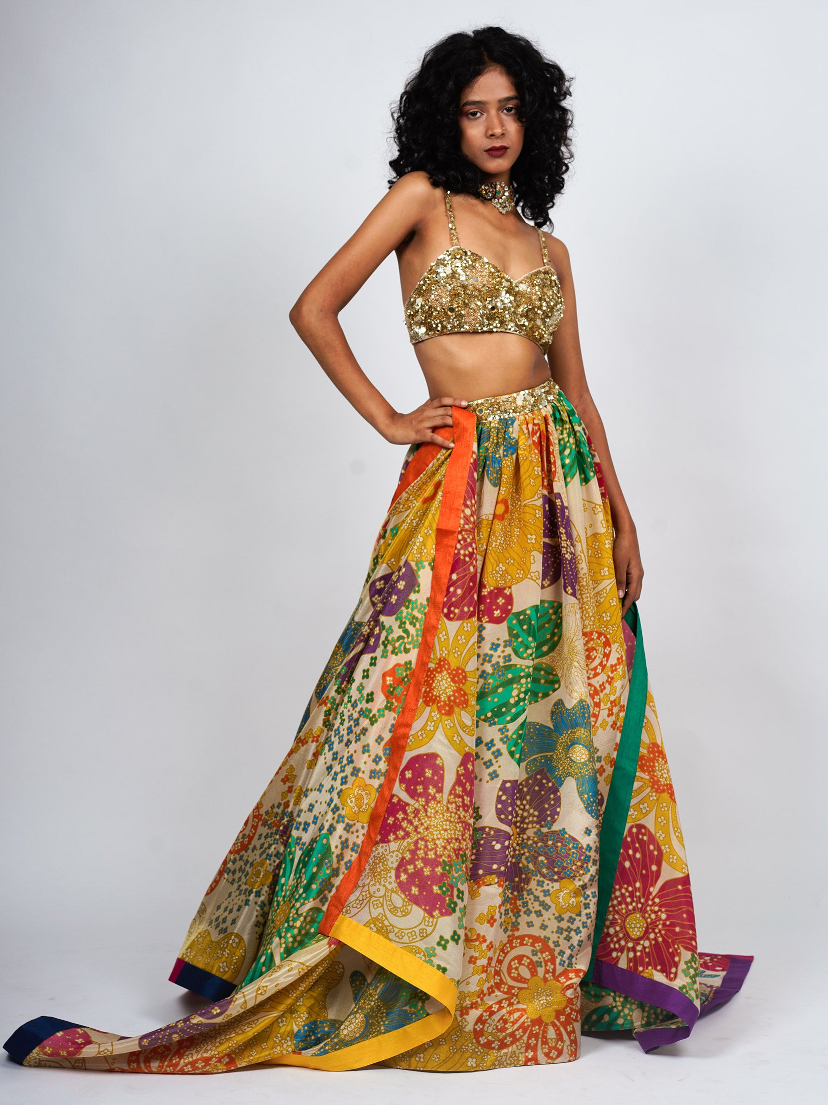 Printed Gather Lehenga Paired With An Embroidered Bustier And Printed Dupatta With Colour Blocked Border