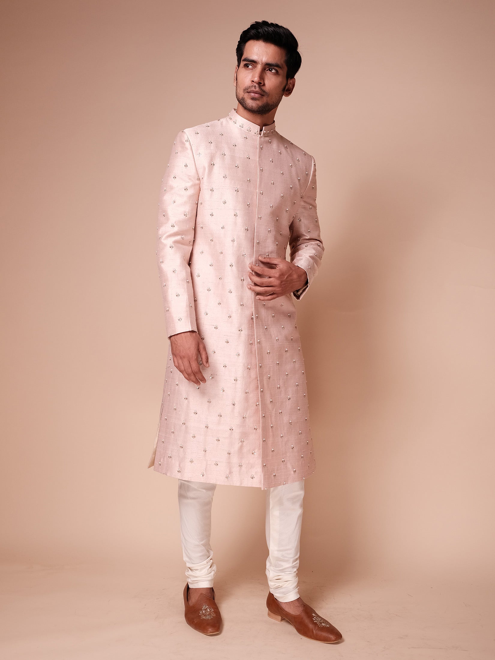 Light Pink Sherwani With All Over Embroidered Pearl Motifs Paired With Kurta And Churidar