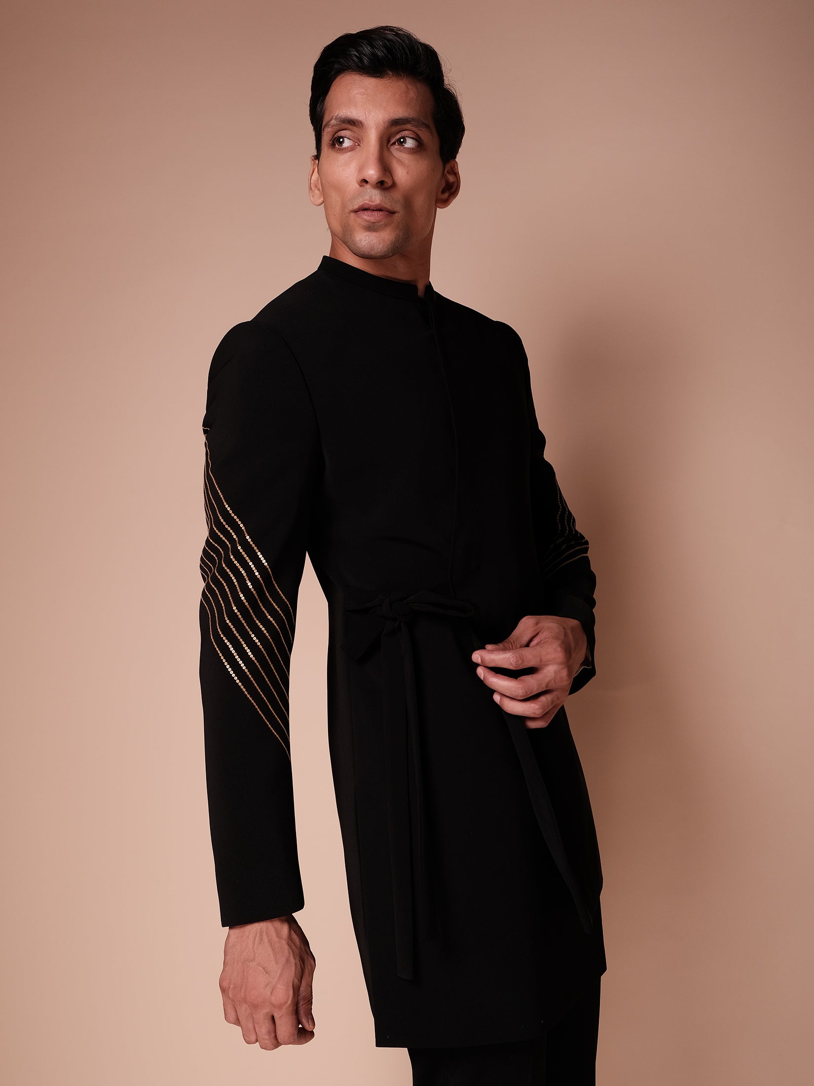 Black Indowestern With Embroidered Sleeve Lines And Tie Up Detail Paired With Fiited Pants