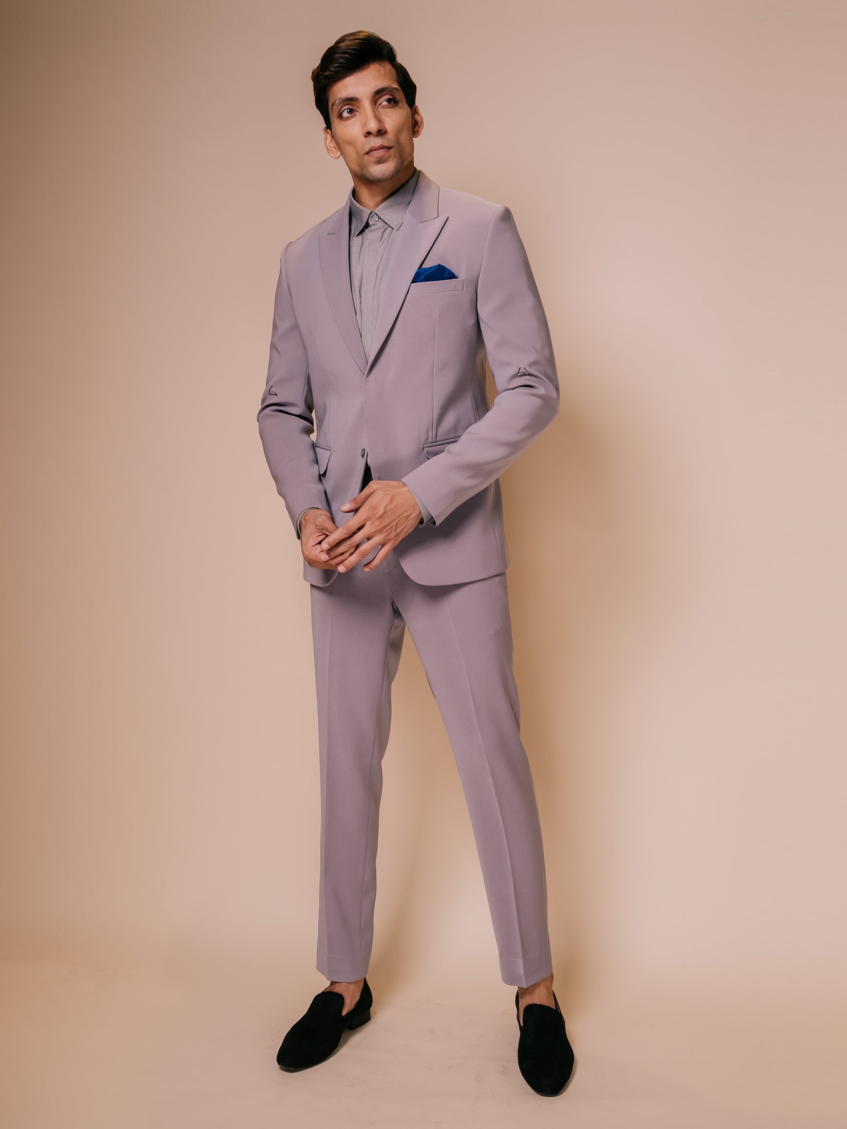 Grey Peak Shawl Lapel Suit With Embroidered Triangle Motif On Sleeves Paired With Trousers And Tonal Shirt