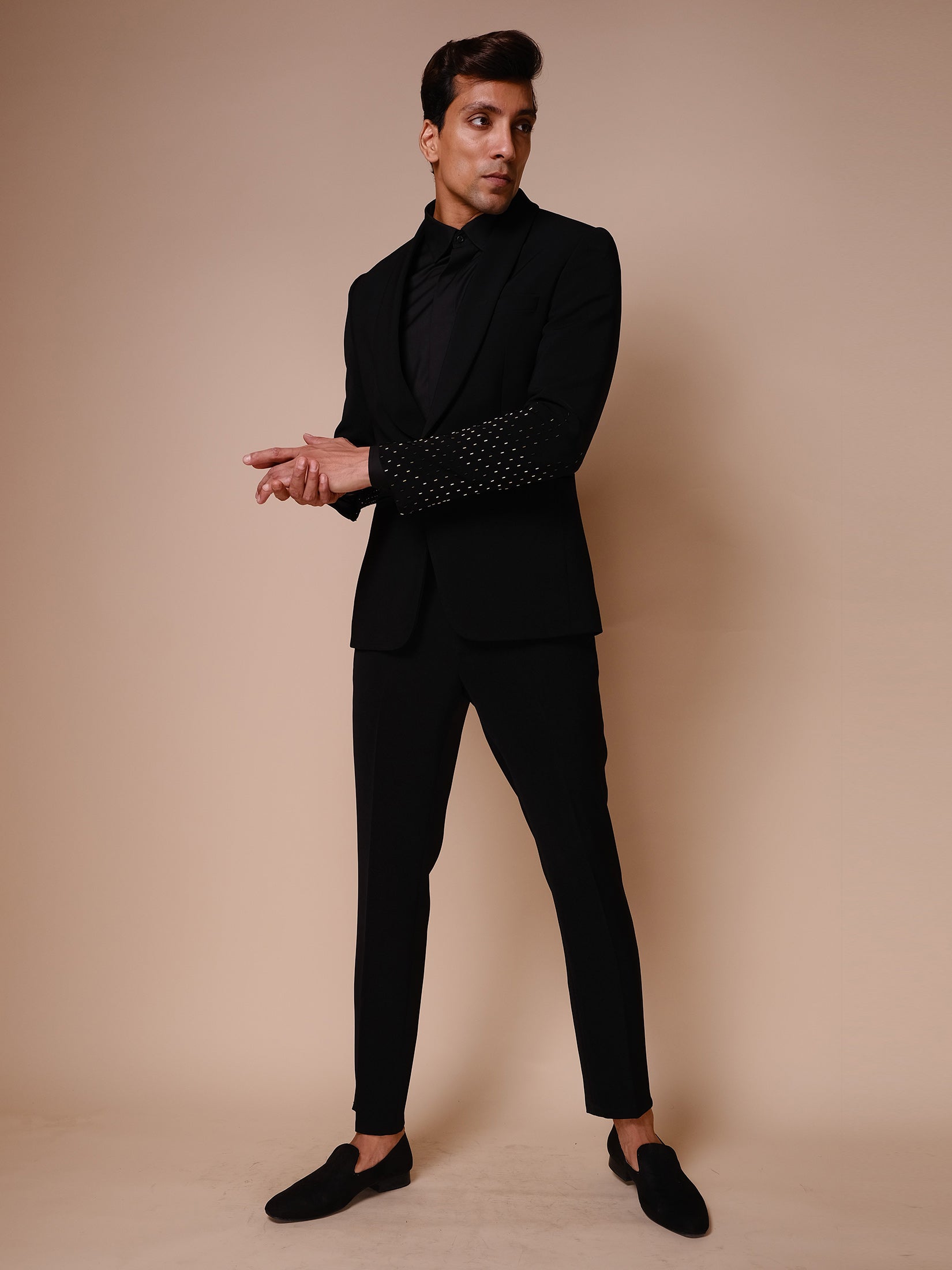 Black Shawl Lapel Tuxedo With Gold Embroidery On Sleeves Paired With Trousers And Tonal Shirt