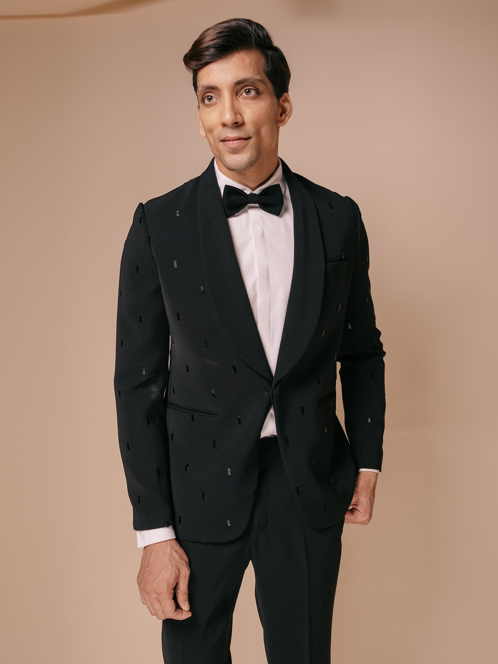 Black Shawl Lapel Tuxedo With All Over Stack Motifs Paired With Trousers And Tonal Shirt