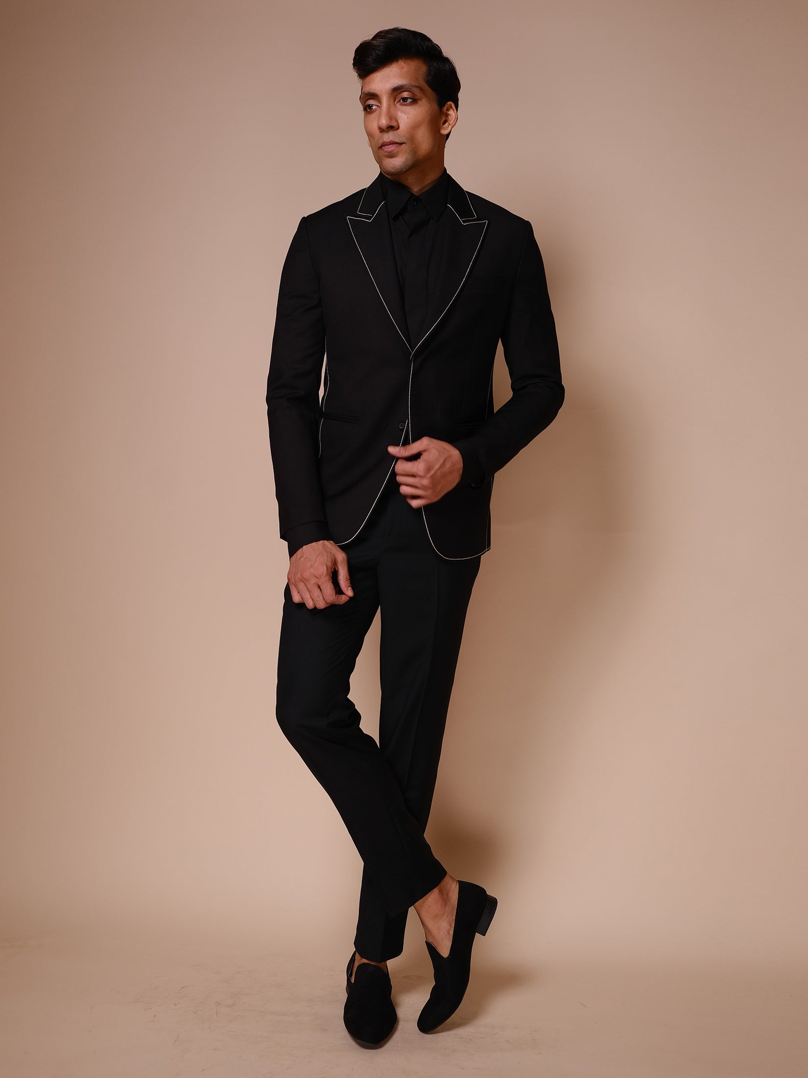 Black Peak Lapel Suit With All Over White Outline  Paired With Trousers And Tonal Shirt